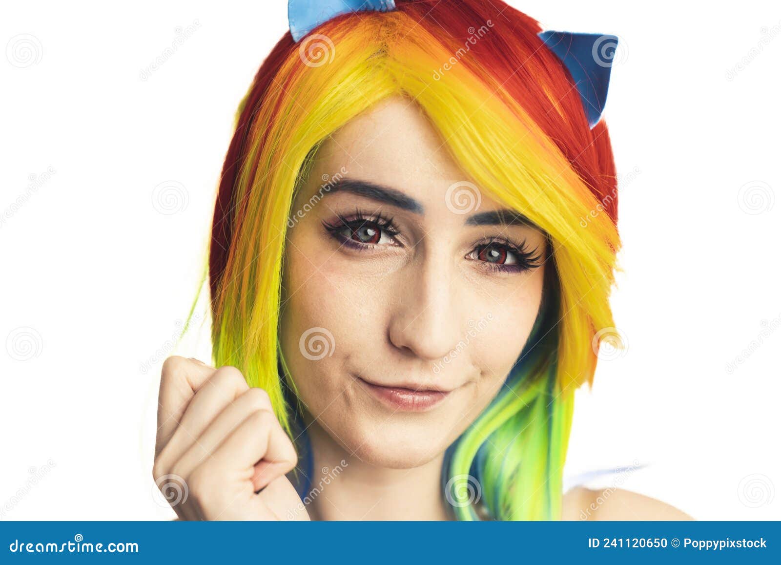 Pretty Rainbow Haired European Flirty Woman Posing With Her Hands Near To Her Face Medium Close