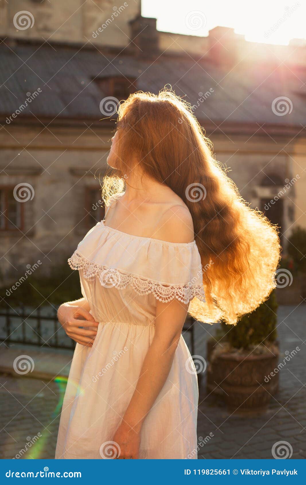 Pretty Redhead Girl With Long Lush Hair Posing With