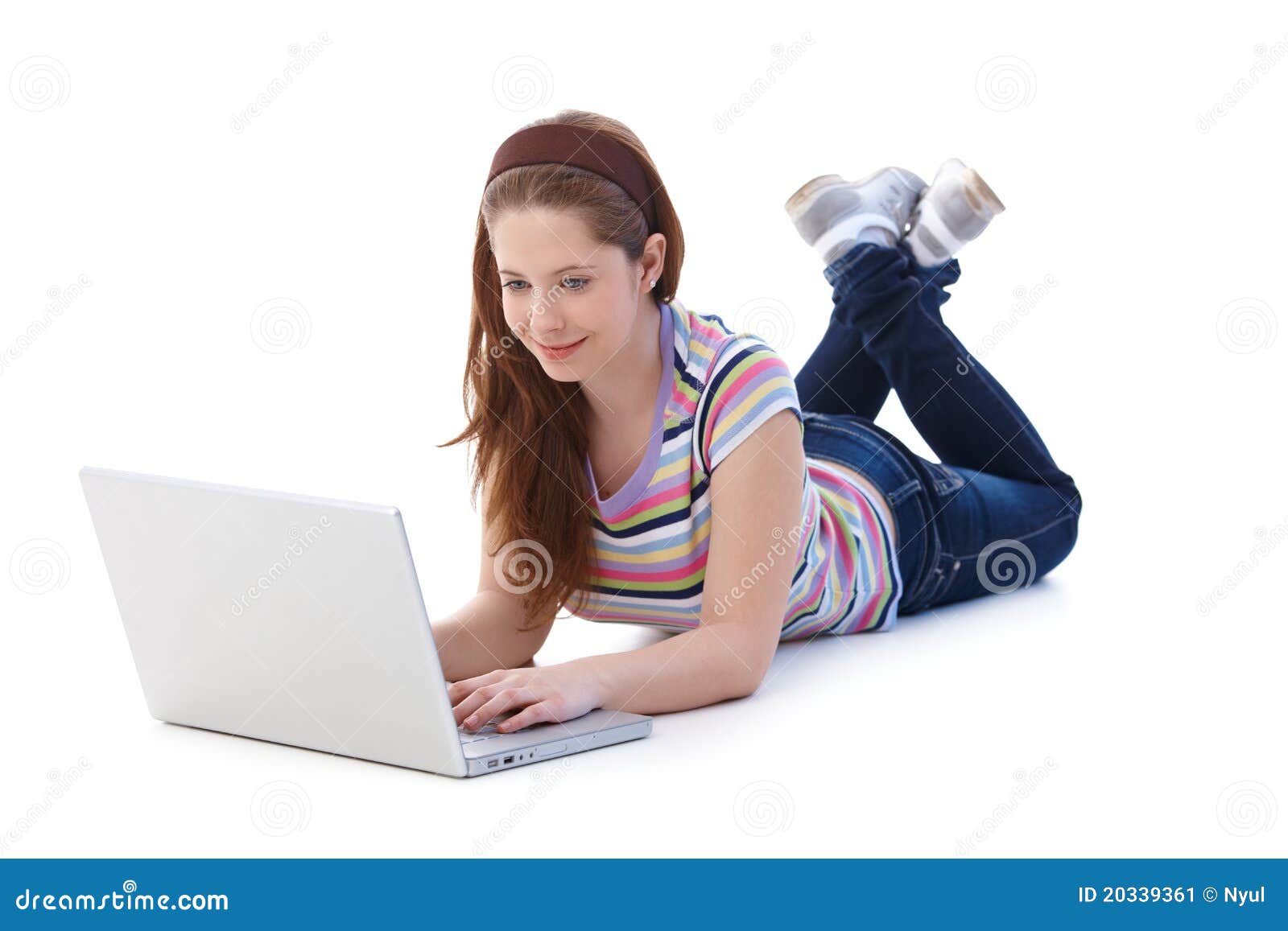 pretty schoolgirl browsing internet smiling