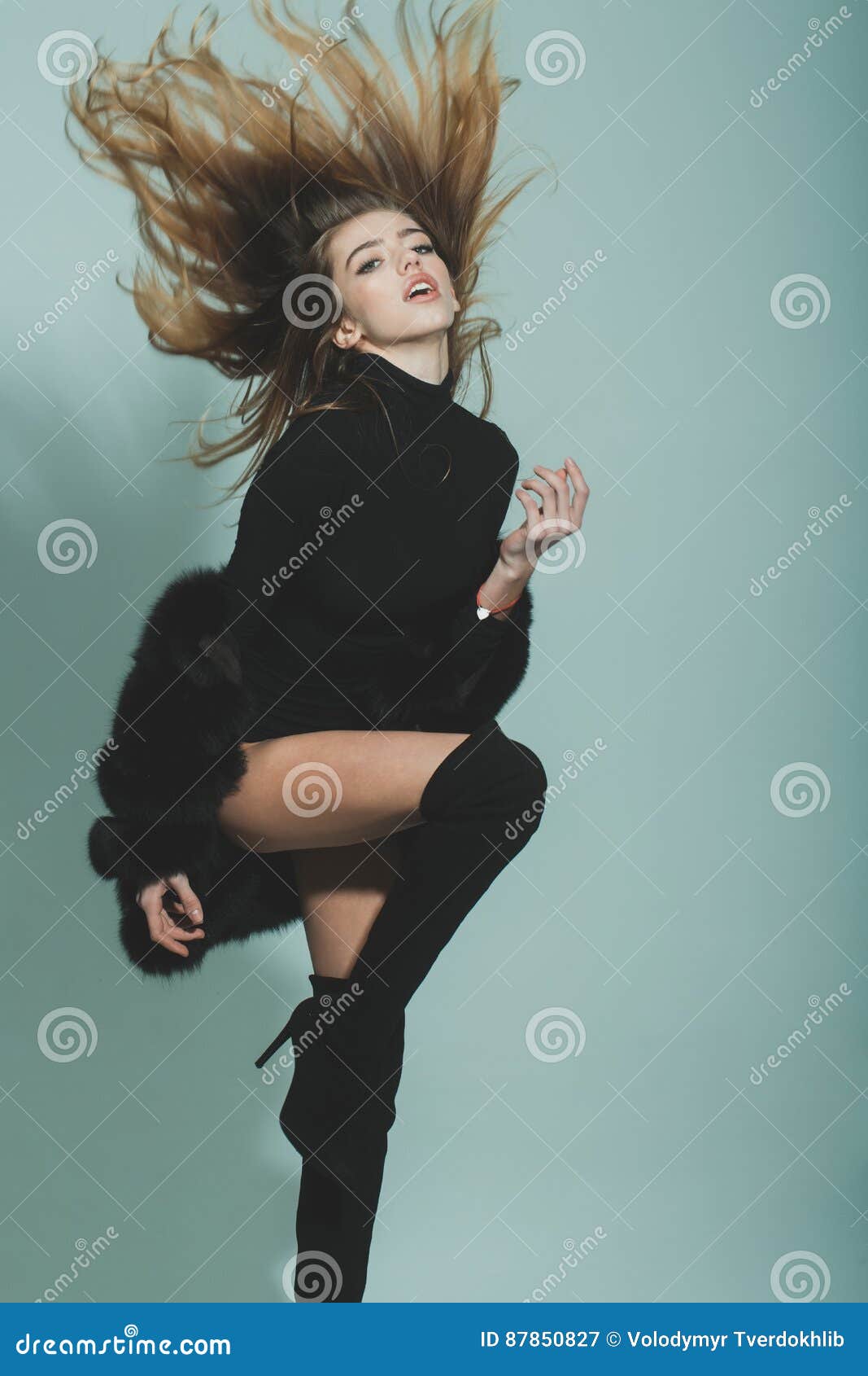 Pretty Woman with Long Hair in Fur and Jackboot Stock Image - Image of ...