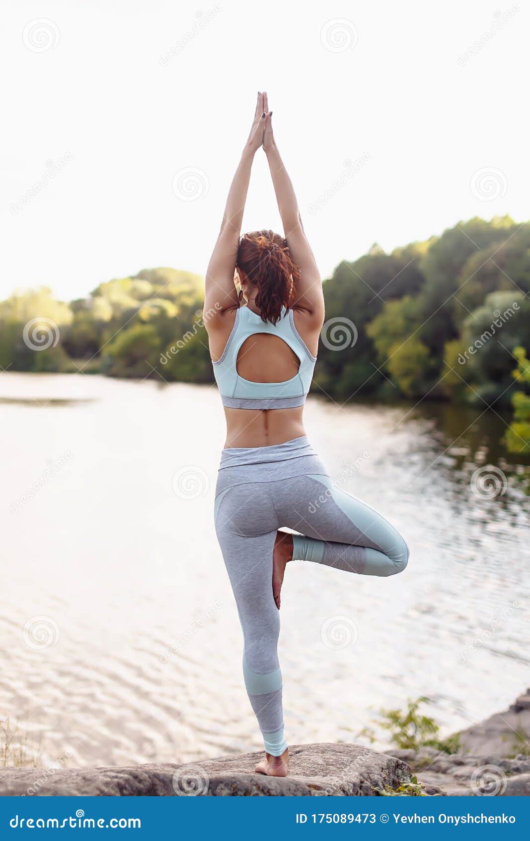 Sexy Woman Doing Yoga Exercises Stock Photo 339695060