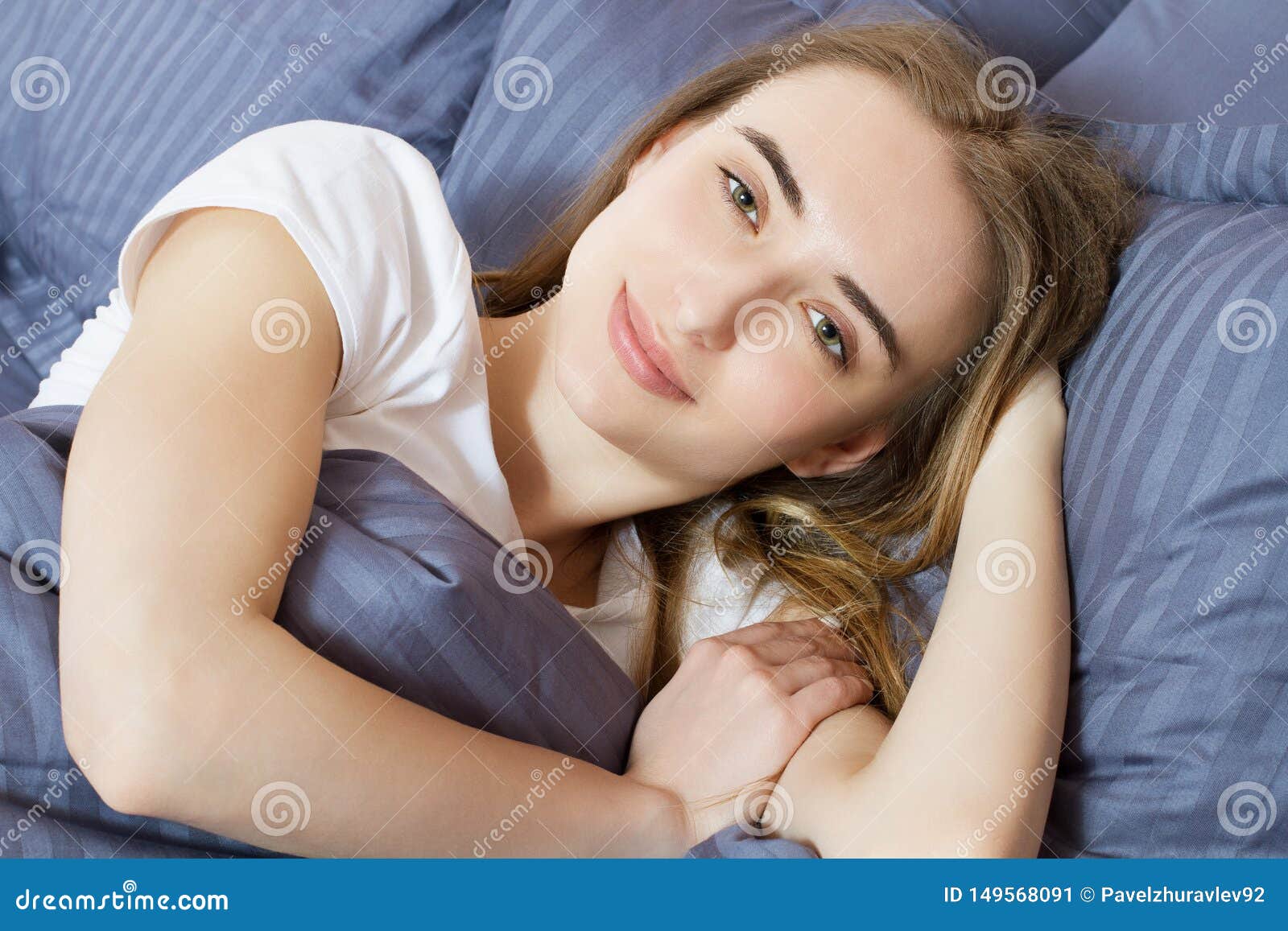 Pretty Smile Girl Laying In Bed Lovely Female Posing In A Bedroom