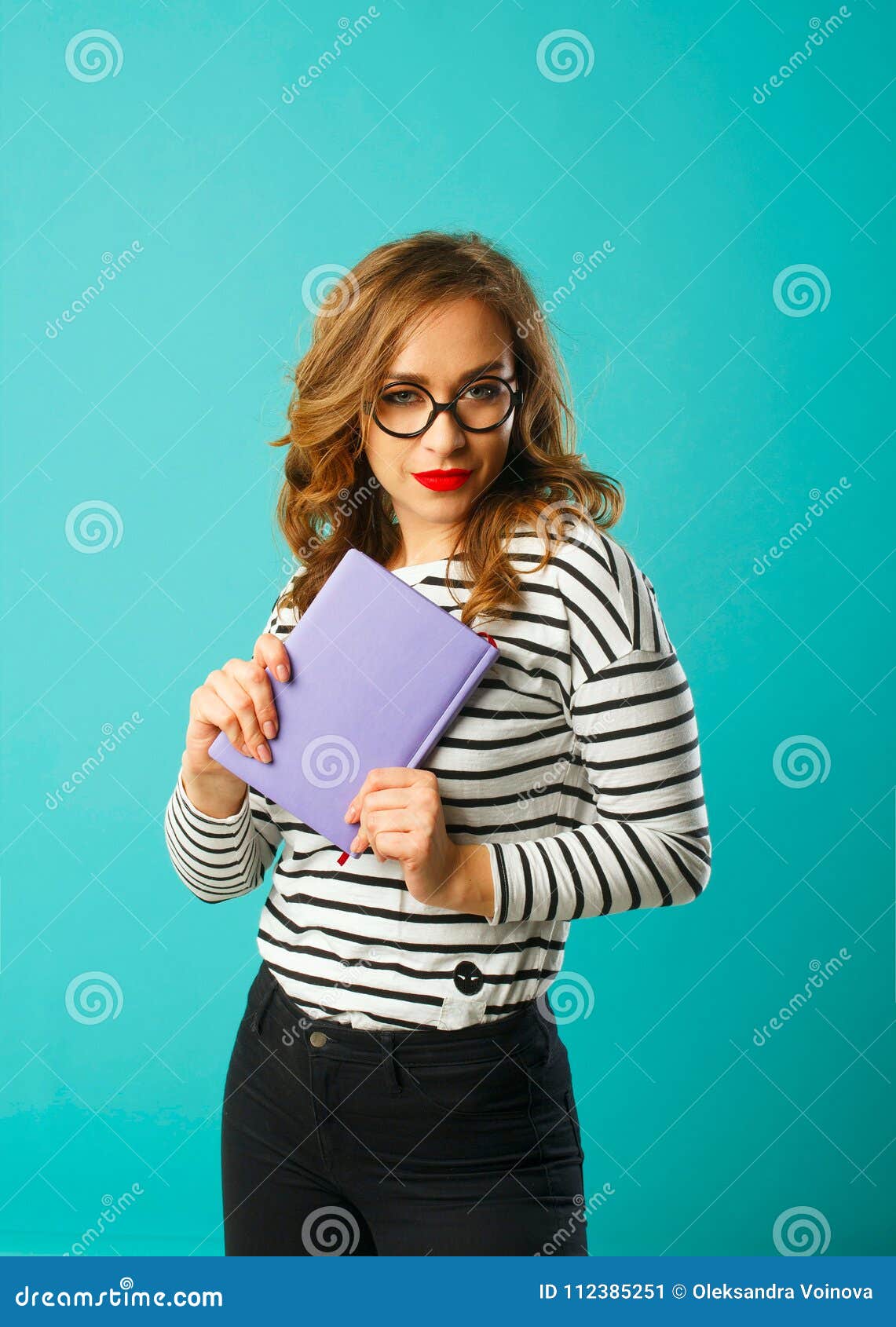 Pretty Student with Book Wearing Glasses Over Blue Background Stock ...