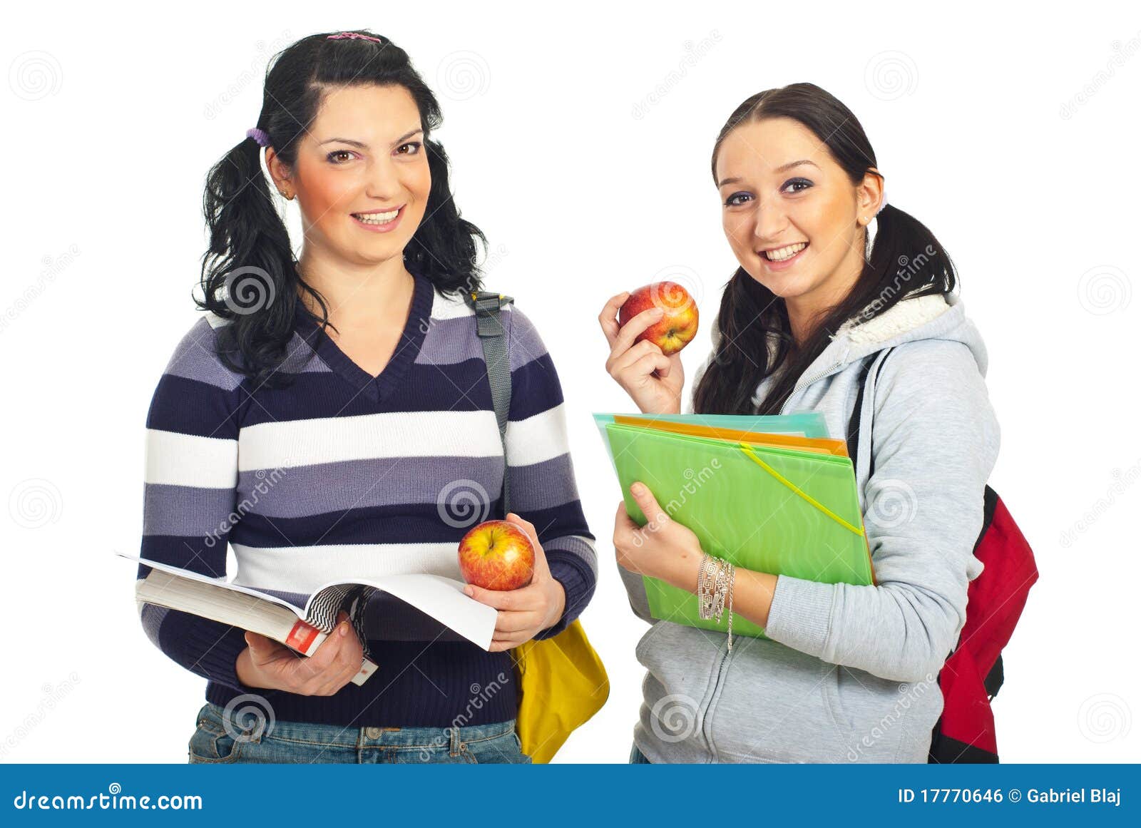 pretty students females holding apples