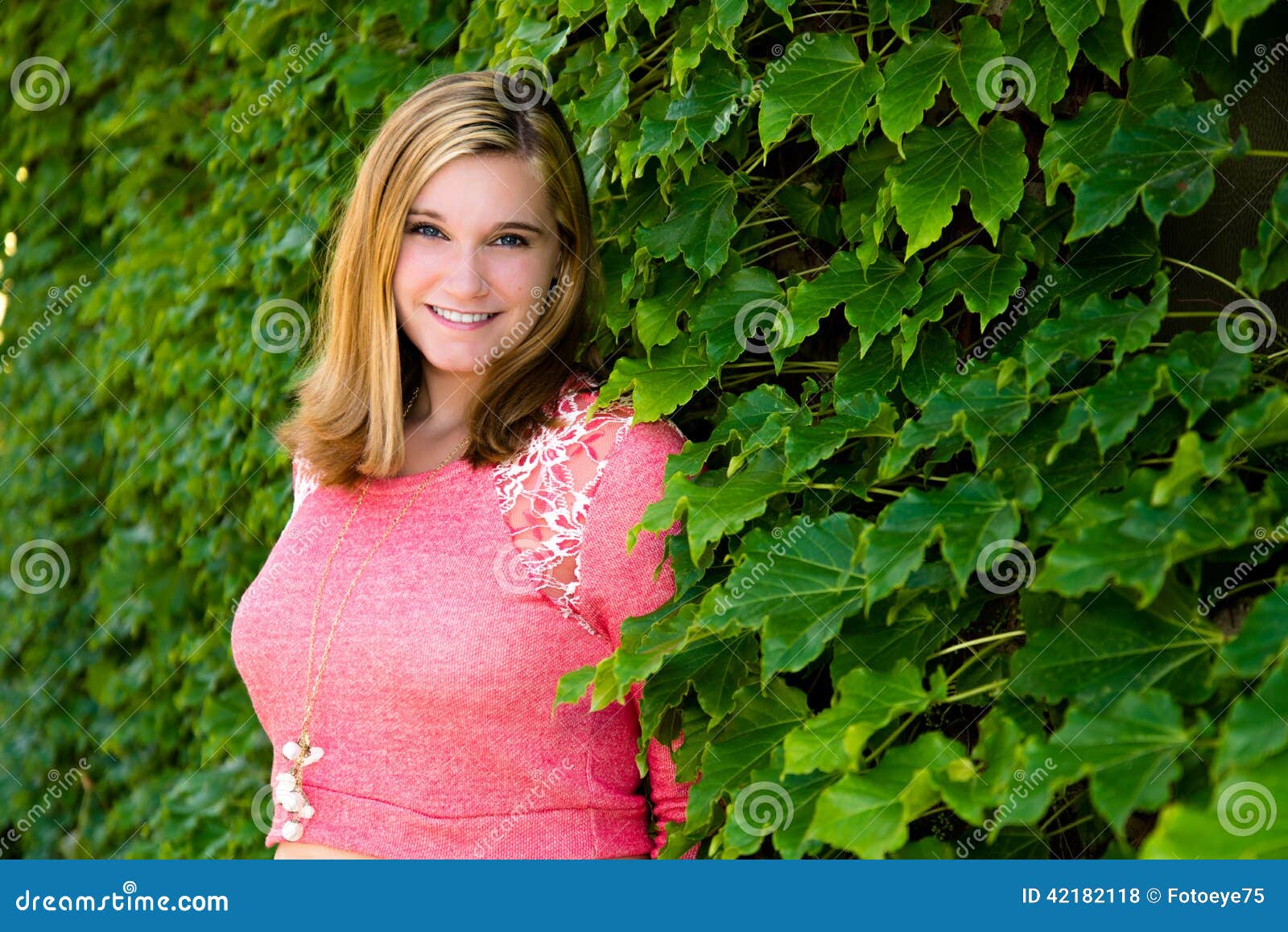 Pretty Teen Girl Pink Sweater Green Ivy Stock Photo