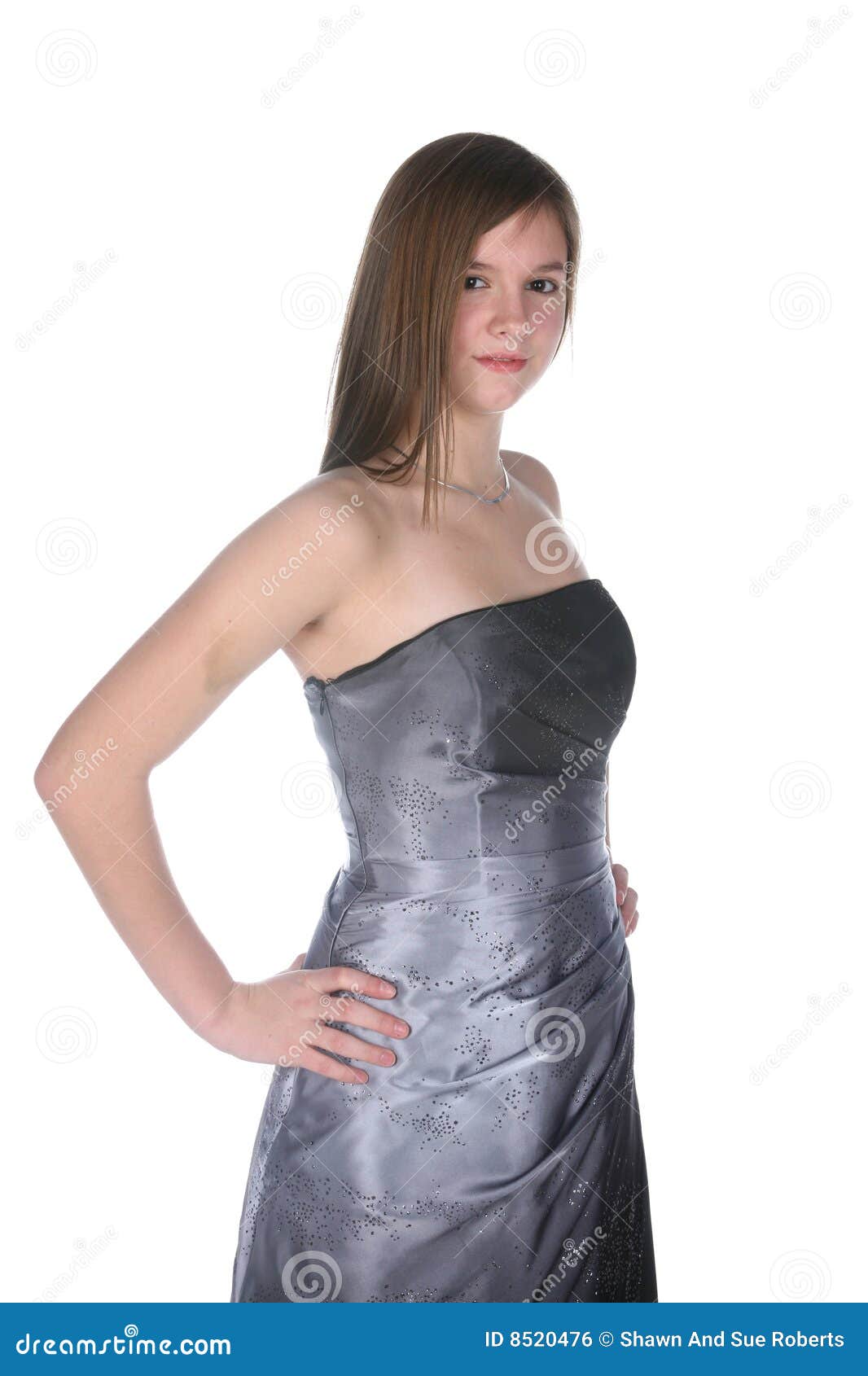 pretty teenage girl in gray strapless formal gown