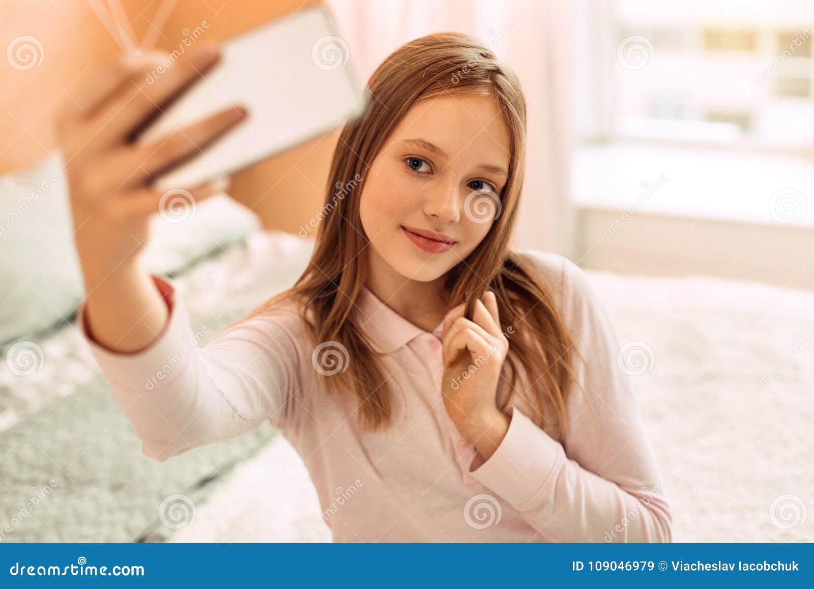 Pretty Teenage Girl Posing while Taking Selfies Stock Image - Image of ...