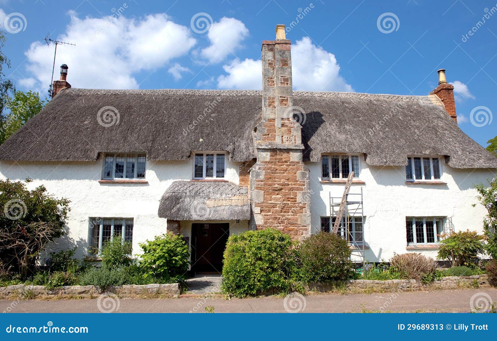 A Pretty Thatched Cottage in Otterton, Devon, UK Stock Image Image of