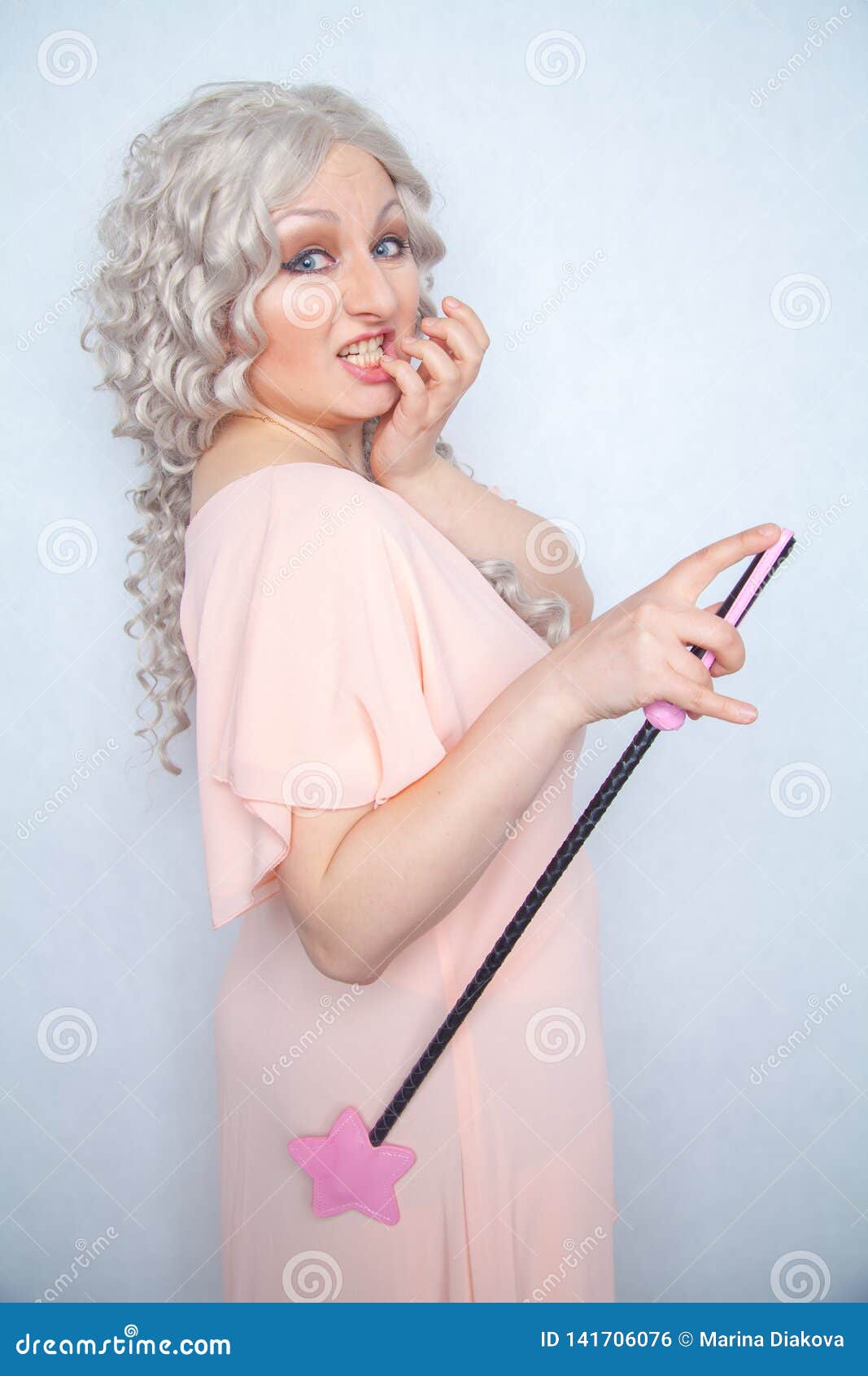 Kinky Pretty Woman with Pink Star Riding Crop