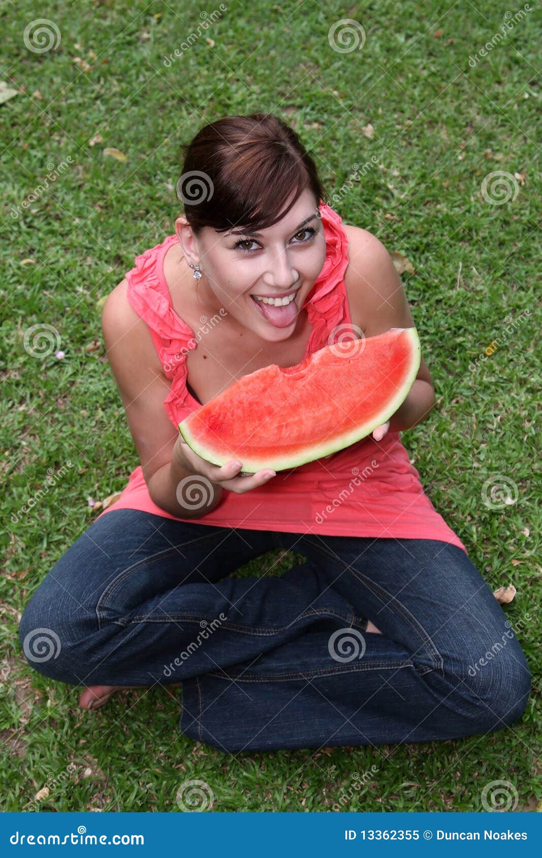 Pretty Watermelon Eater stock image. Image of happy, jeans 13362355