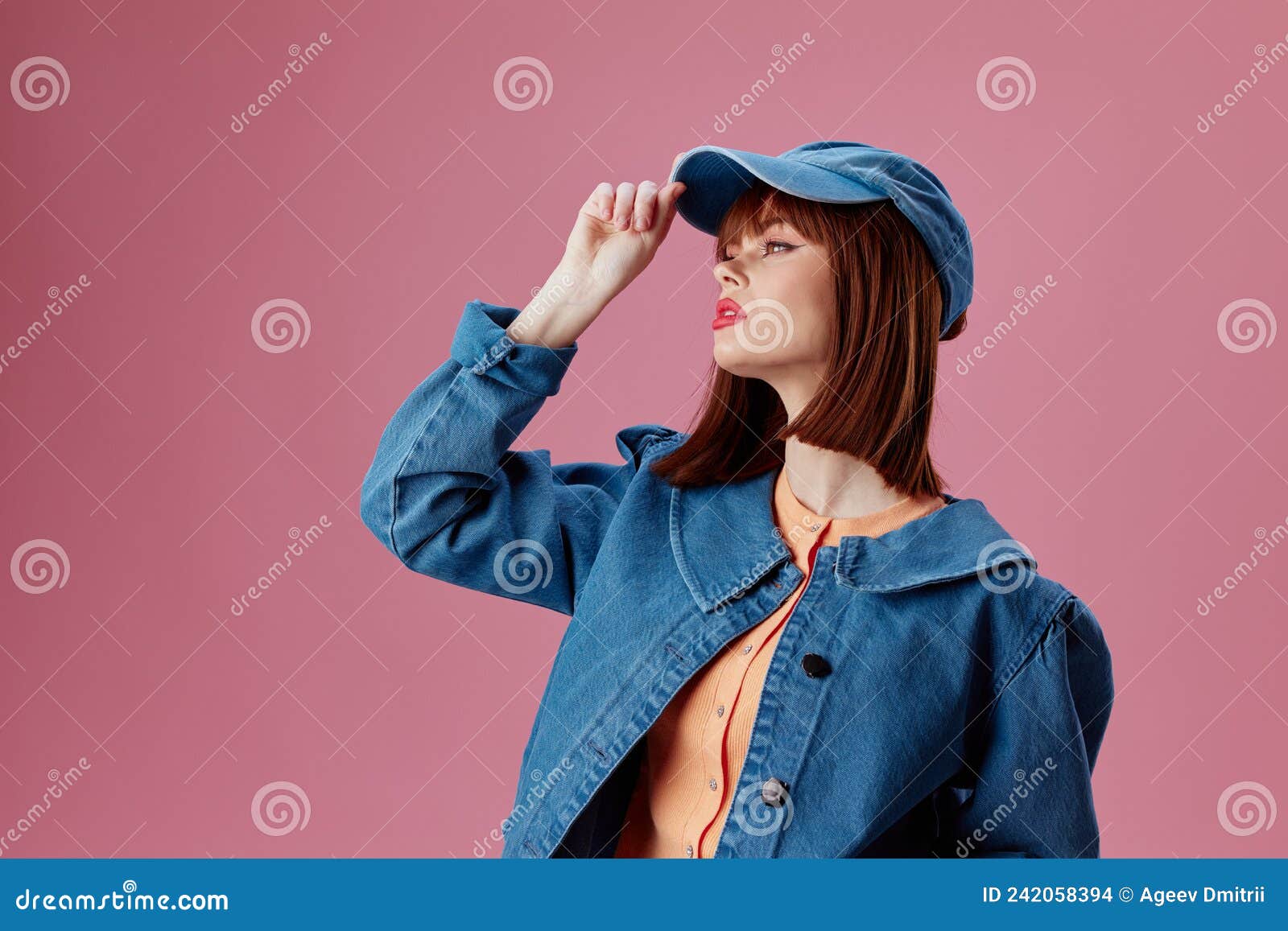 pretty woman stylish denim clothing posing color background unaltered Stock  Photo by shotprime