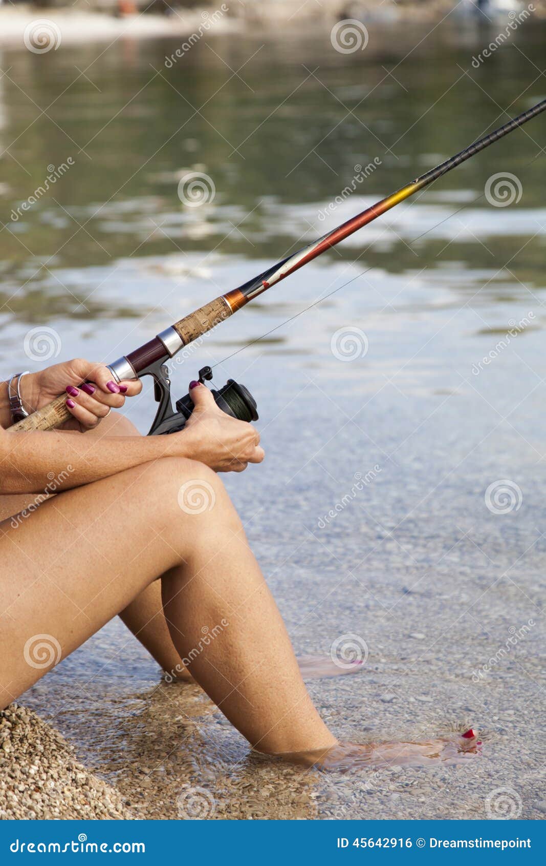 Pretty woman fishing stock photo. Image of fishing, beach - 45642916