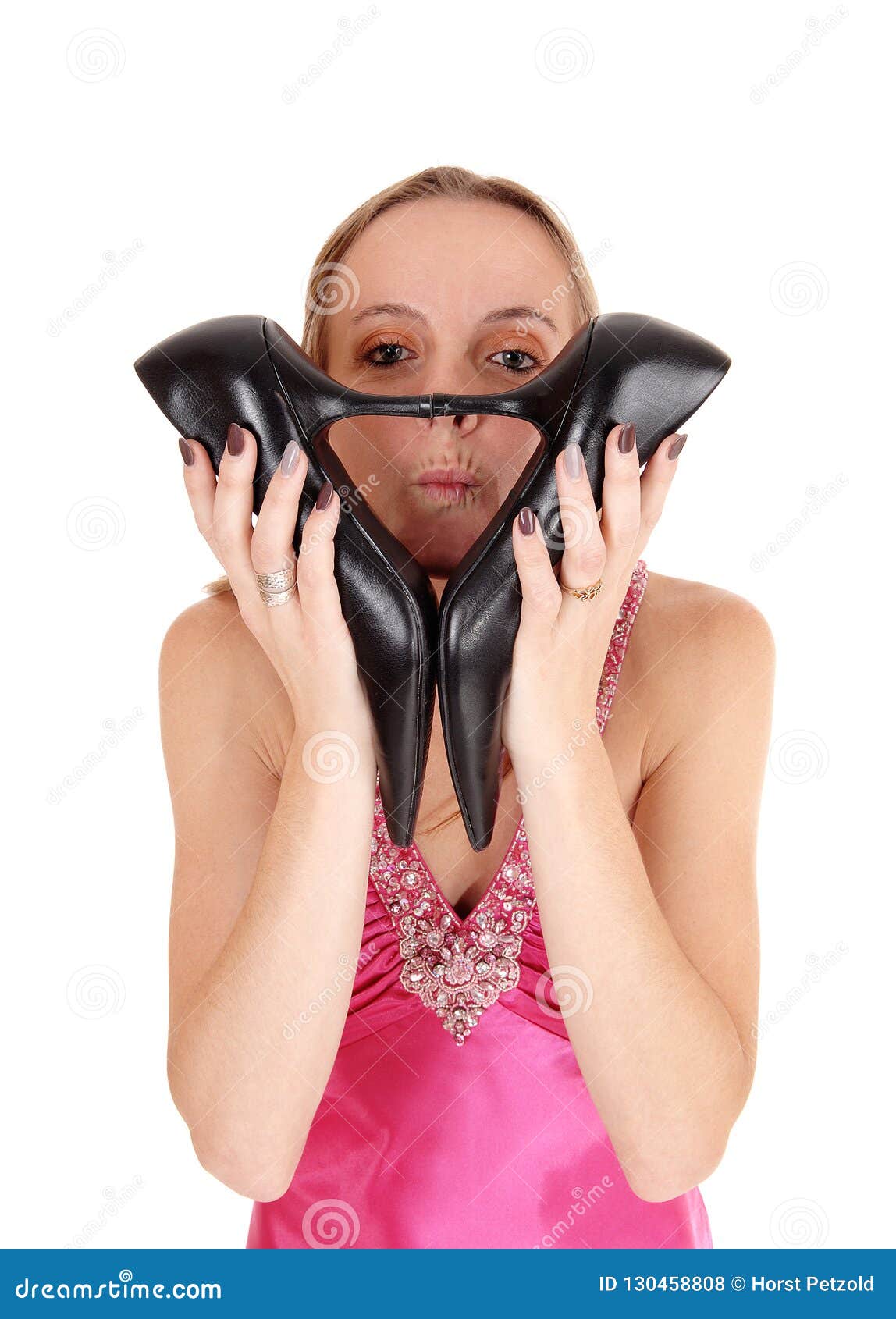 Pretty Woman Holding Her Heels Over Face Stock Photo - Image of female