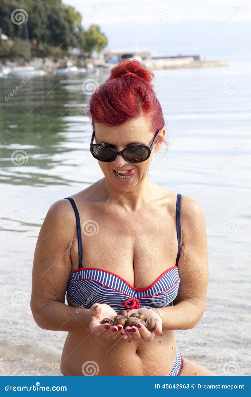 Middle Aged Asian Woman Holding 39