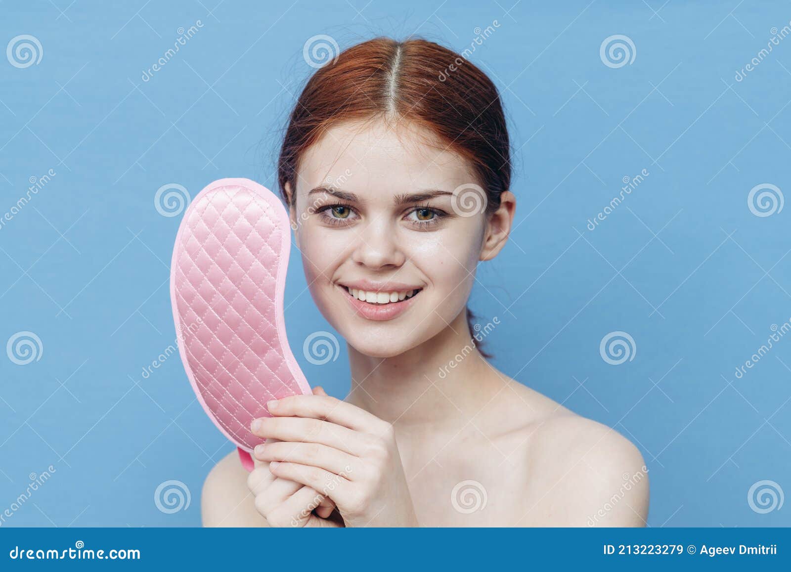 Pretty Woman With Pink Sleep Mask On Blue Background Naked Shoulders Smile Model Stock Image