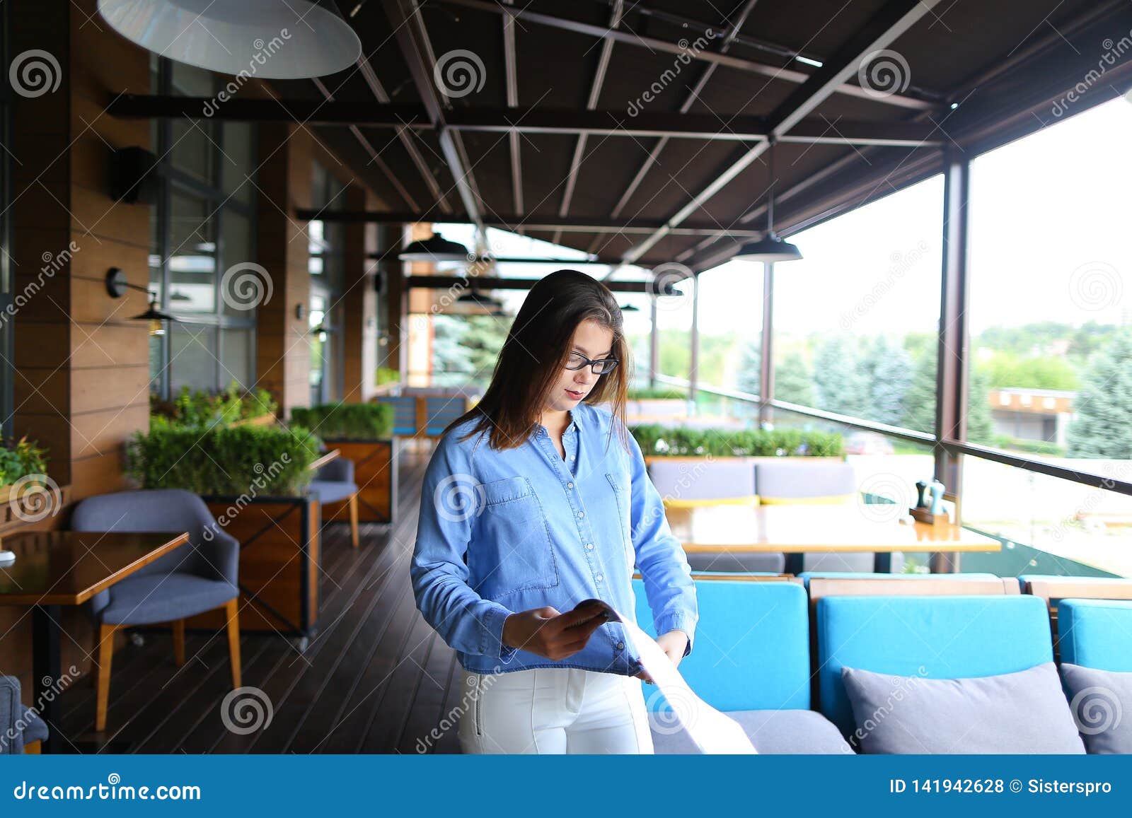 Pretty Woman Reading Menu at Restaurant with Close Up Face . Stock ...