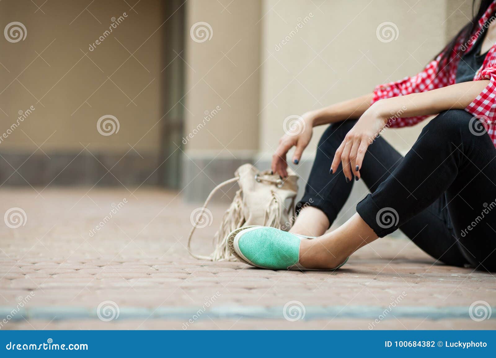 Pretty Woman Sitting on Ground Stock Photo - Image of hair, holiday ...