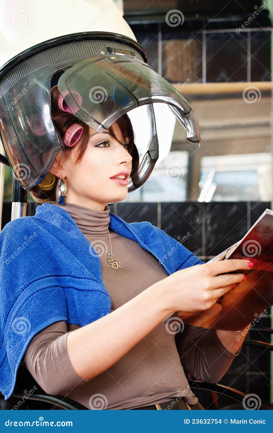 Pretty Woman Under Bonnet Hair Dryer Stock Photo - Image 