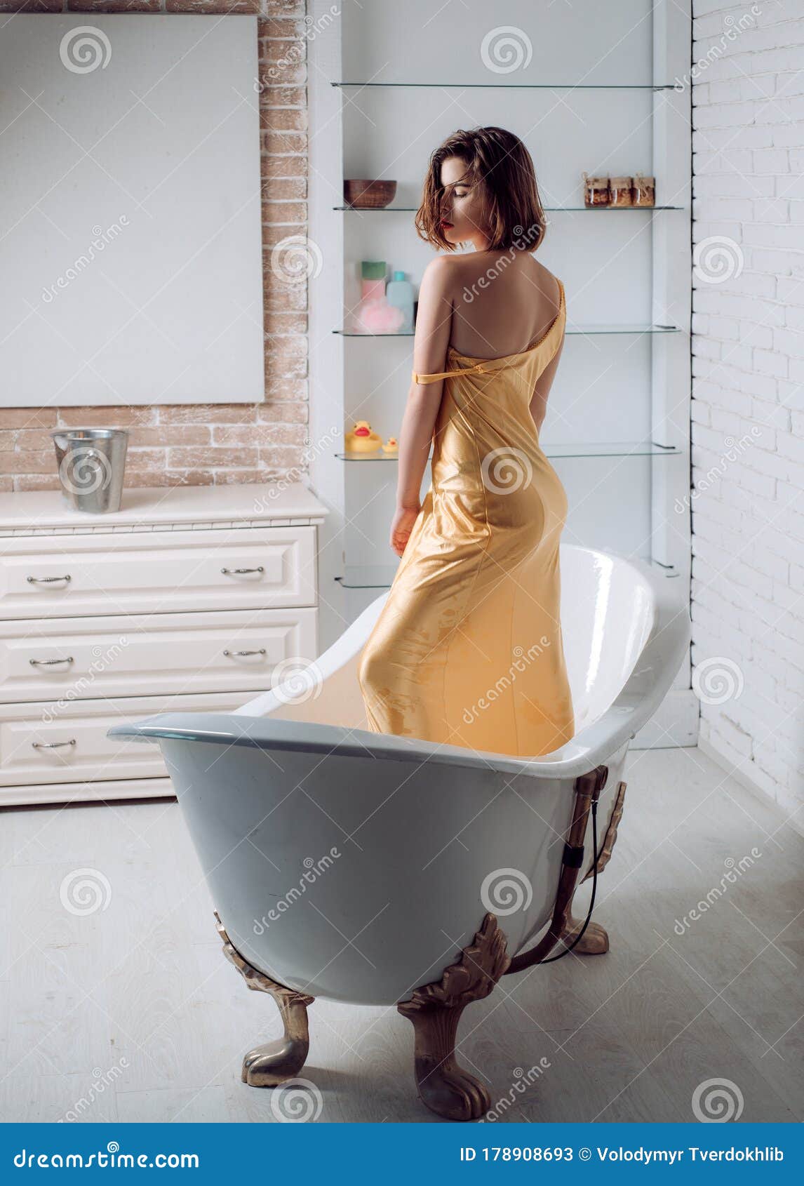 Pretty Woman Wearing Bathrobe In Bathroom Beautiful Woman Relaxing In Bathtub Stock Image