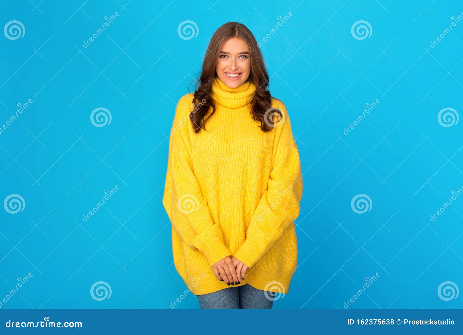 Pretty Woman in Yellow Knitted Sweater, Smiling To Camera Stock Photo ...