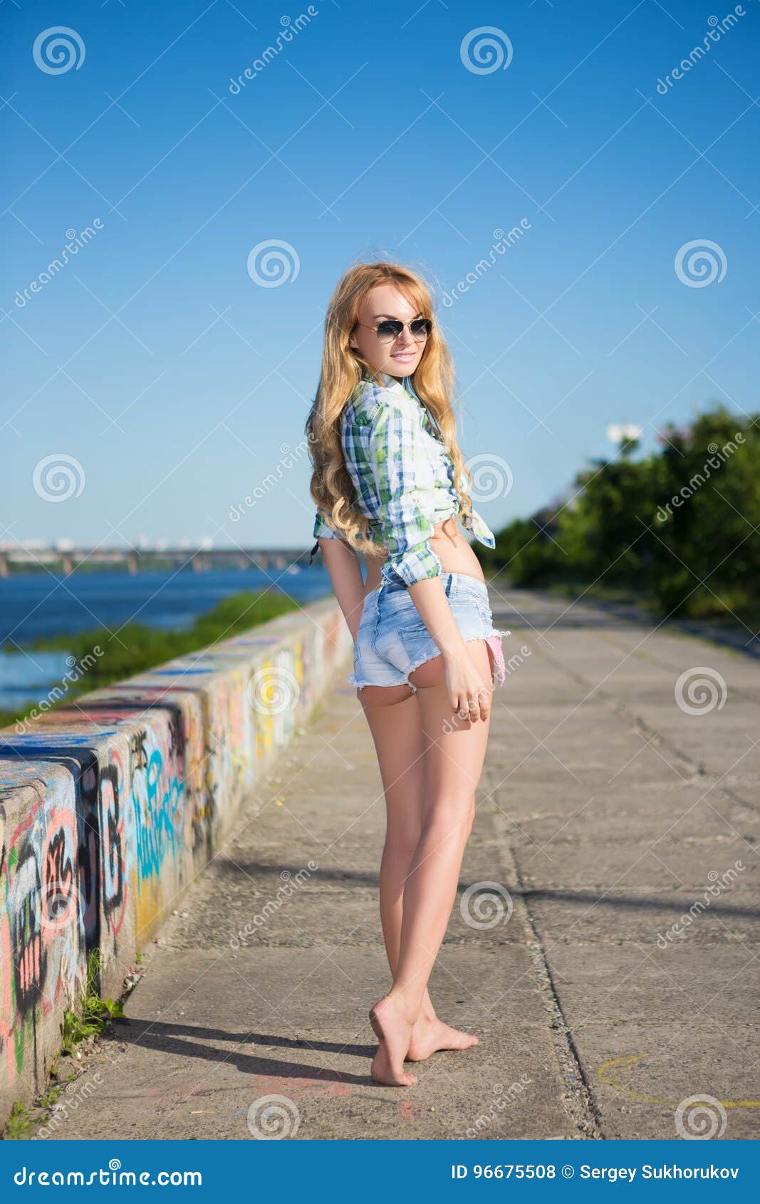 Pretty young blond woman stock photo. Image of barefoot - 96675508