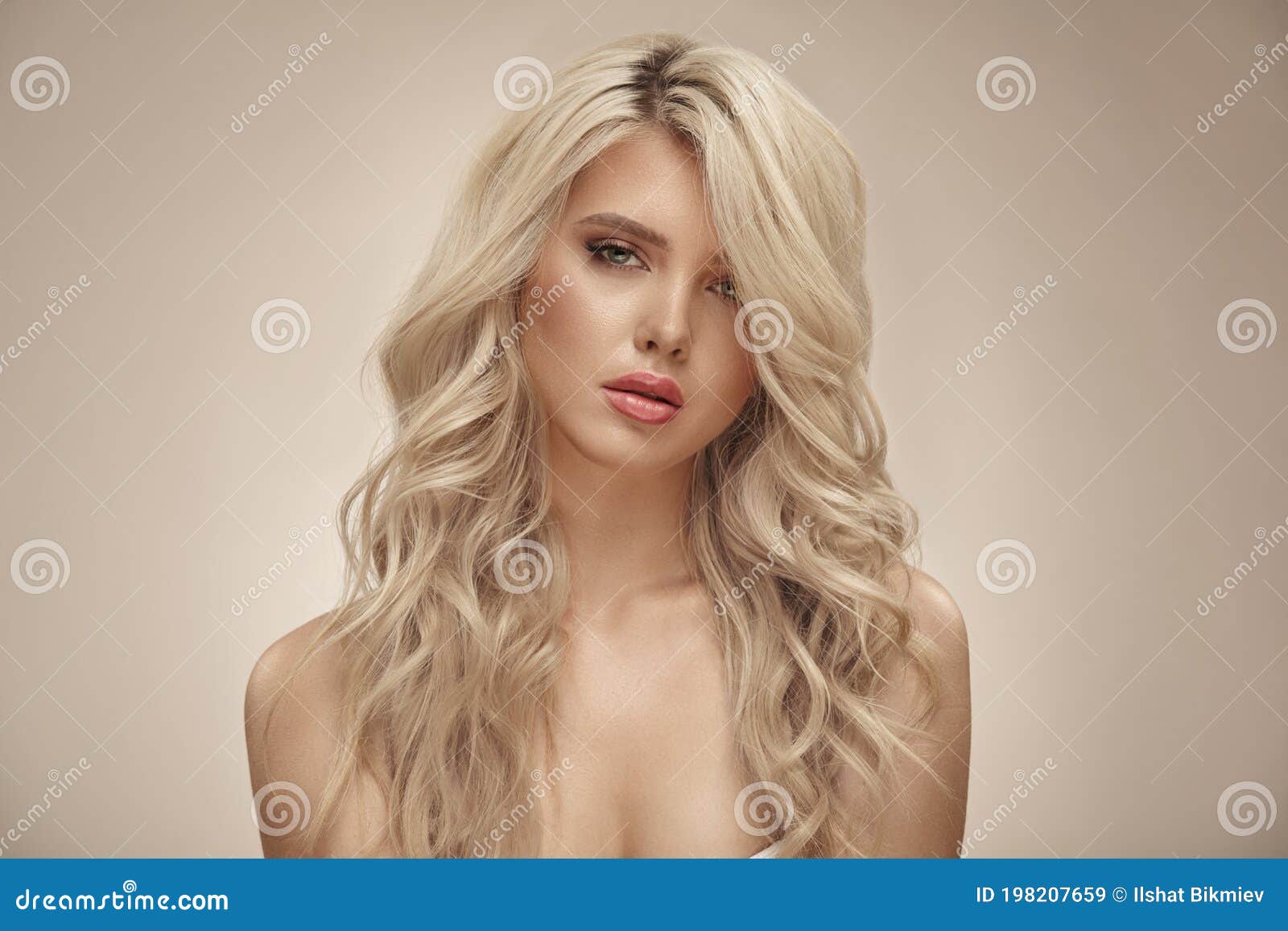 Pretty Young Blonde Woman with Nude Makeup Has a Curly Long Bright Hair, Close Up Portrait on Beige Isolated Stock Image Porn Pic Hd