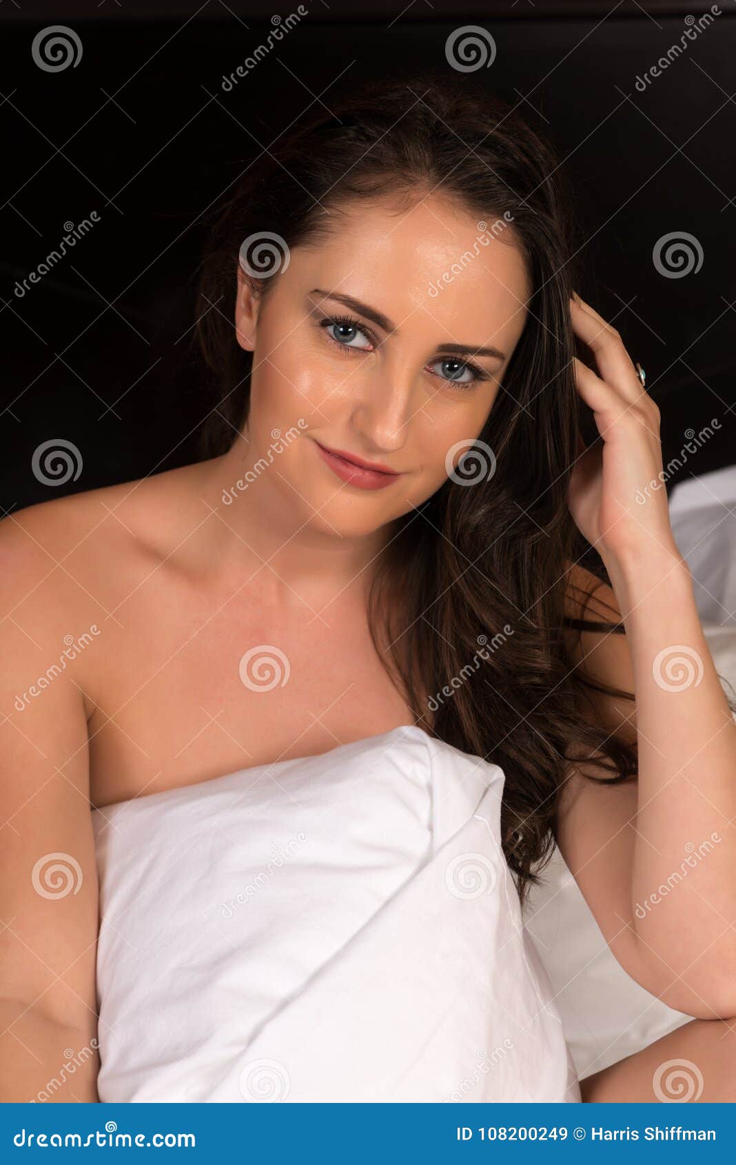 Brunette in bed stock image. Image of gorgeous, brown - 108200249
