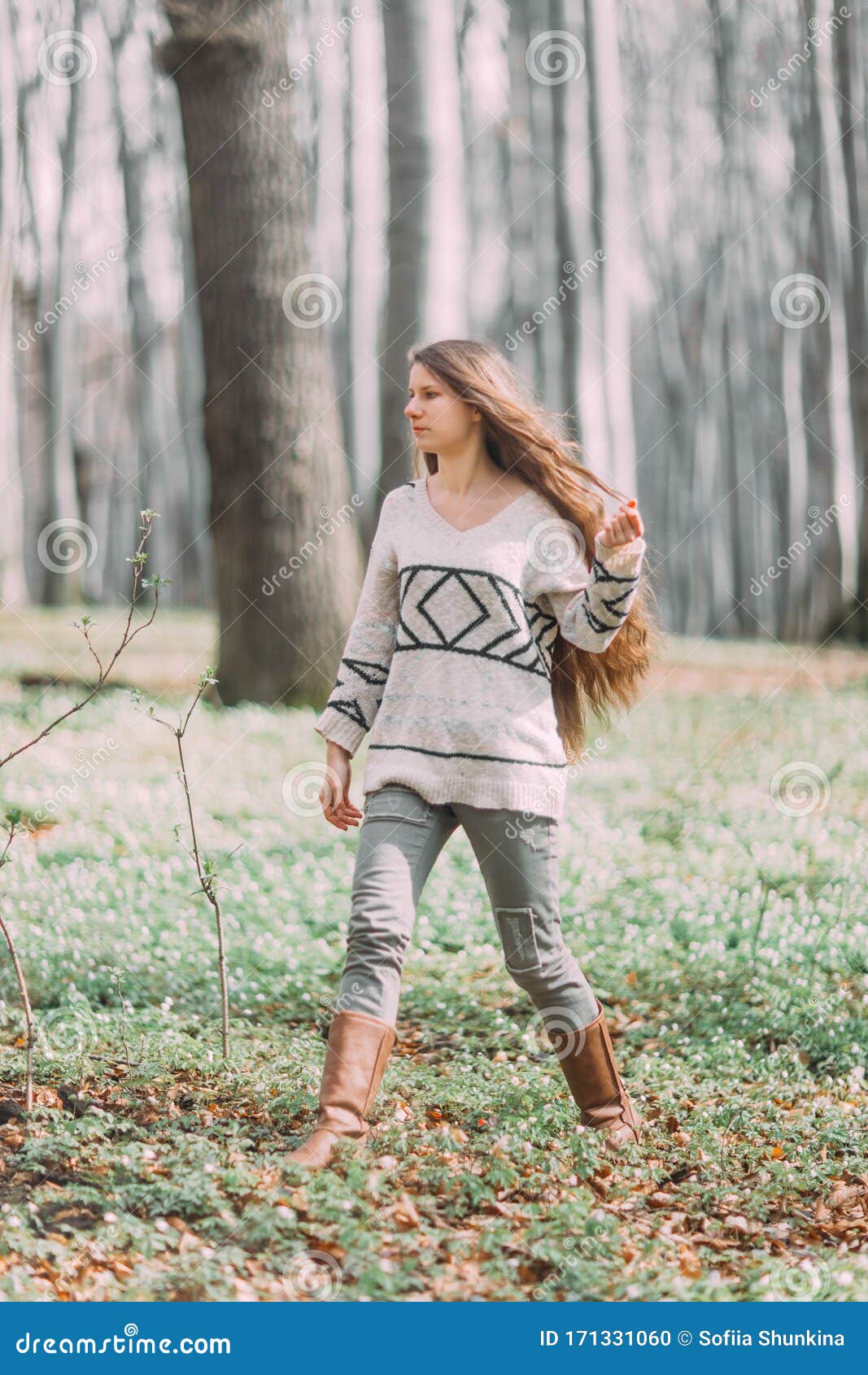 Pretty Young Girl with Long Hair Walking through the Green Forest in ...