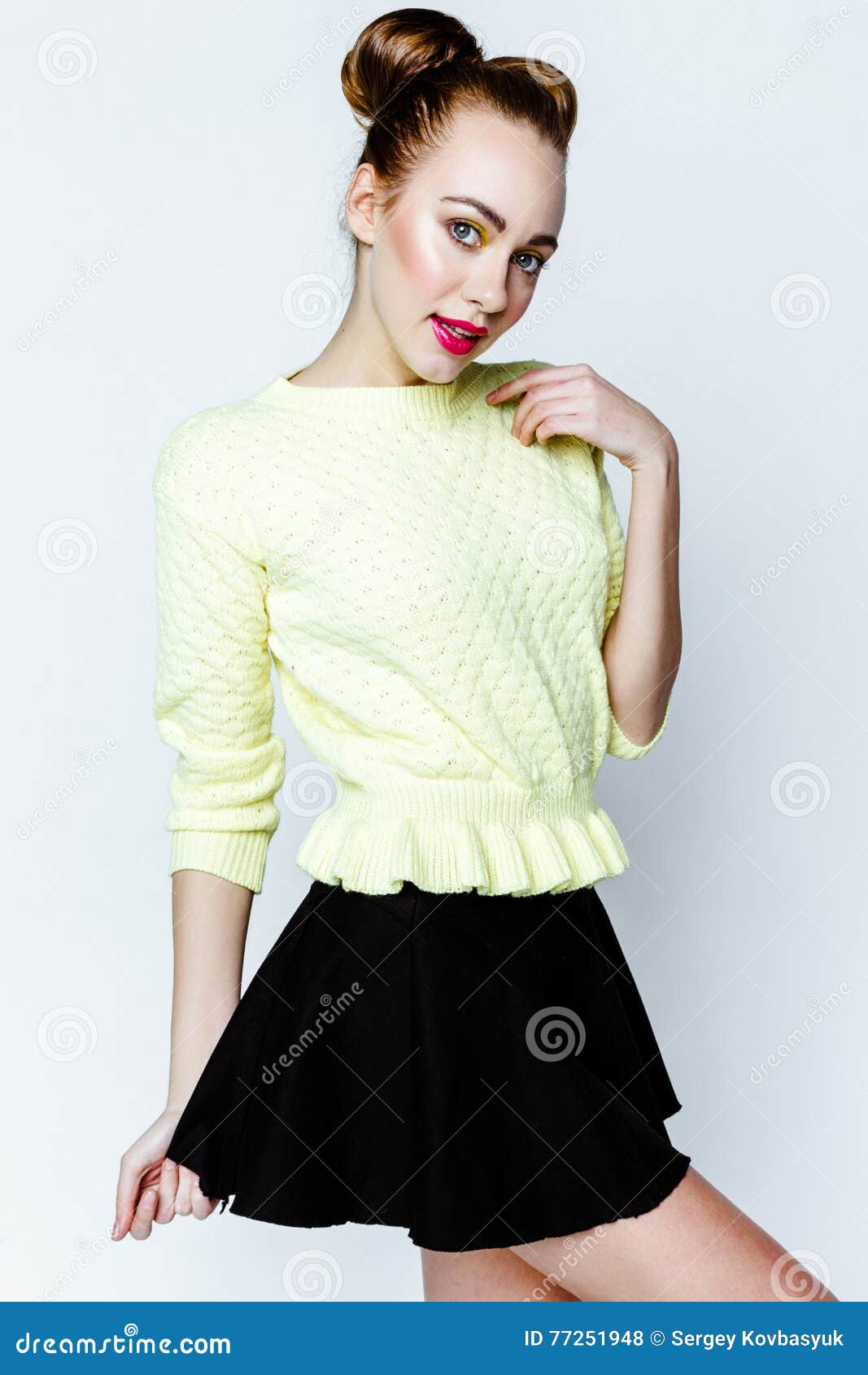 Pretty Young Playful Girl Dressed in Green Pullover and Black Skirt ...