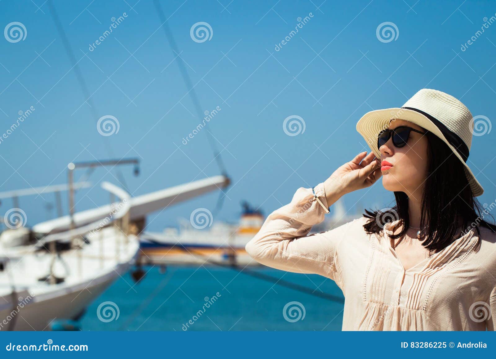 Pretty Young Woman in a Hat and Sunglasses Stock Image - Image of ...