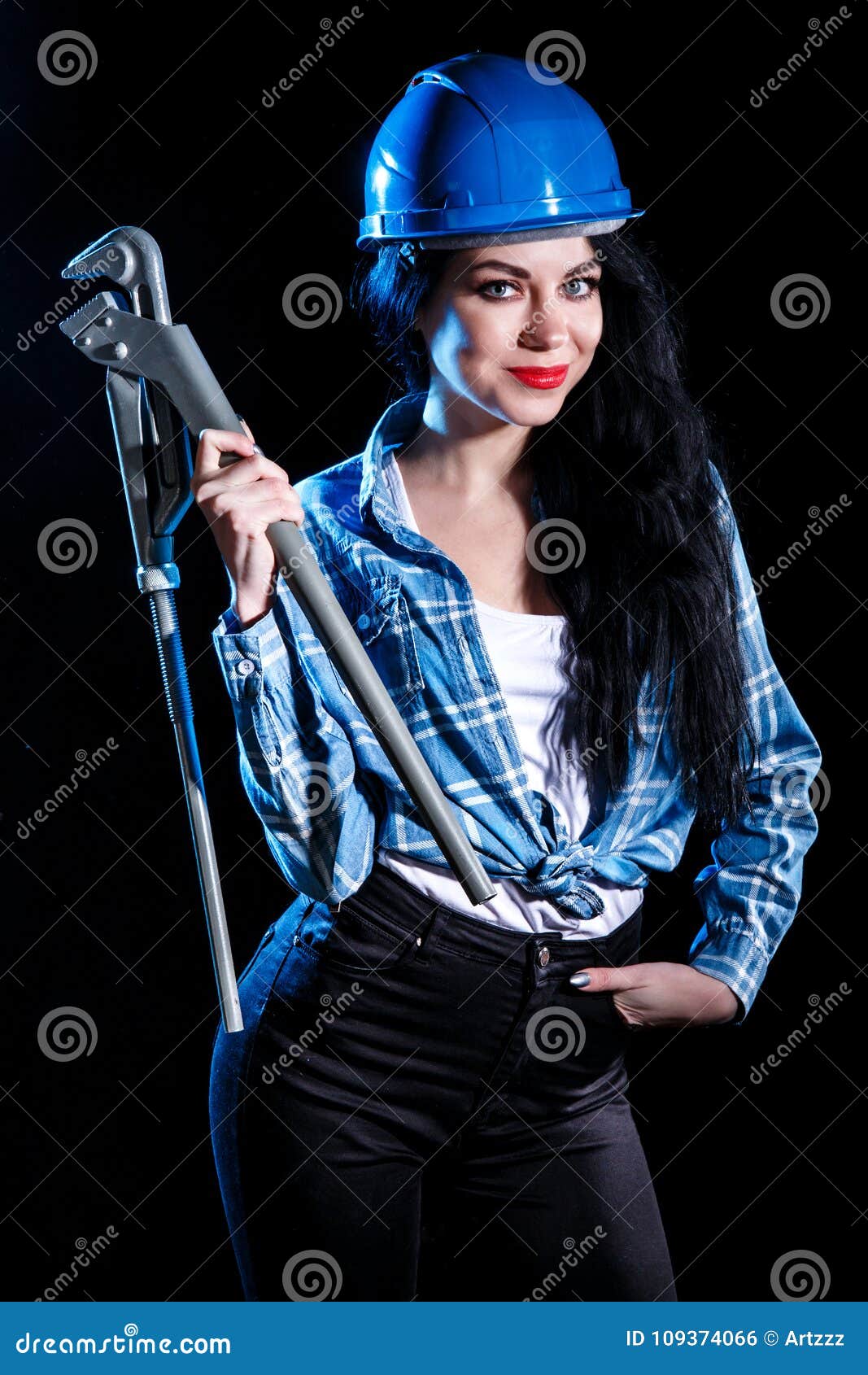 Young Woman with a Pipe Wrench Stock Photo - Image of modern, helmet ...