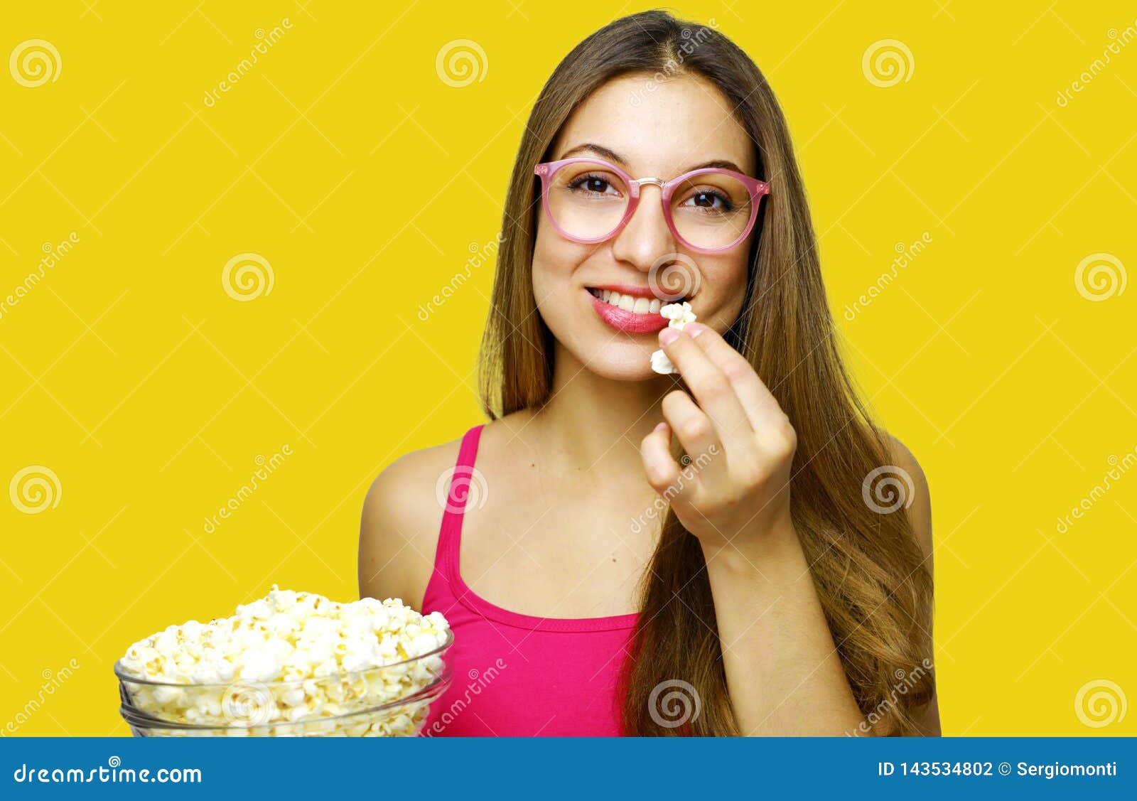 Pretty Young Woman Holding a Pop Corn Bowl Stock Photo Image of