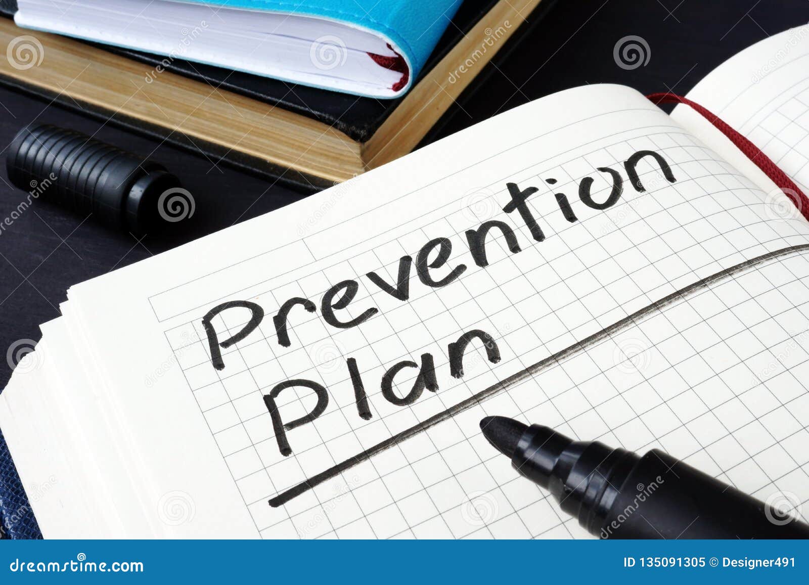 prevention plan written in a note pad.