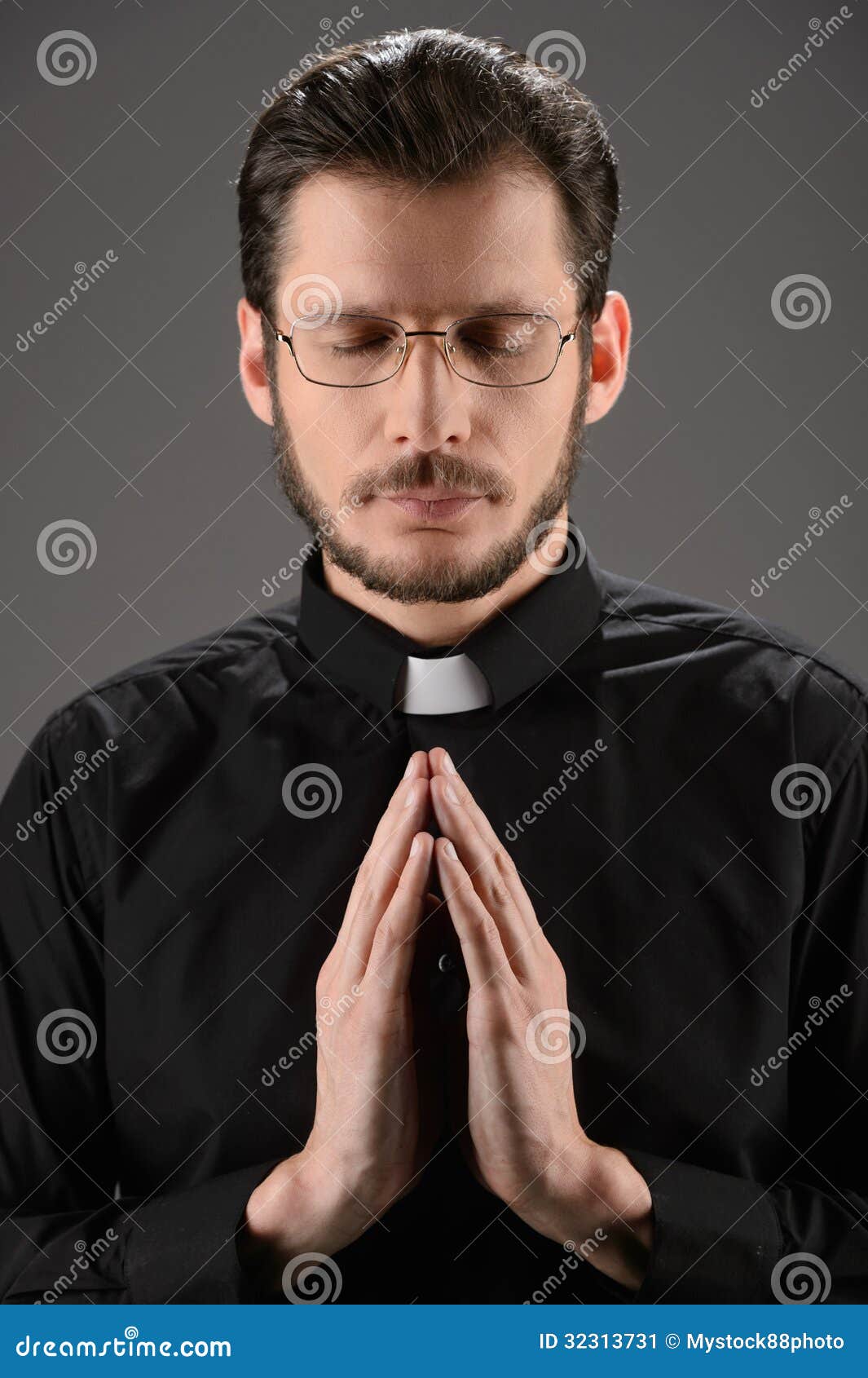 Priest Praying To God. Portrait of Priest Praying while Standing Stock ...