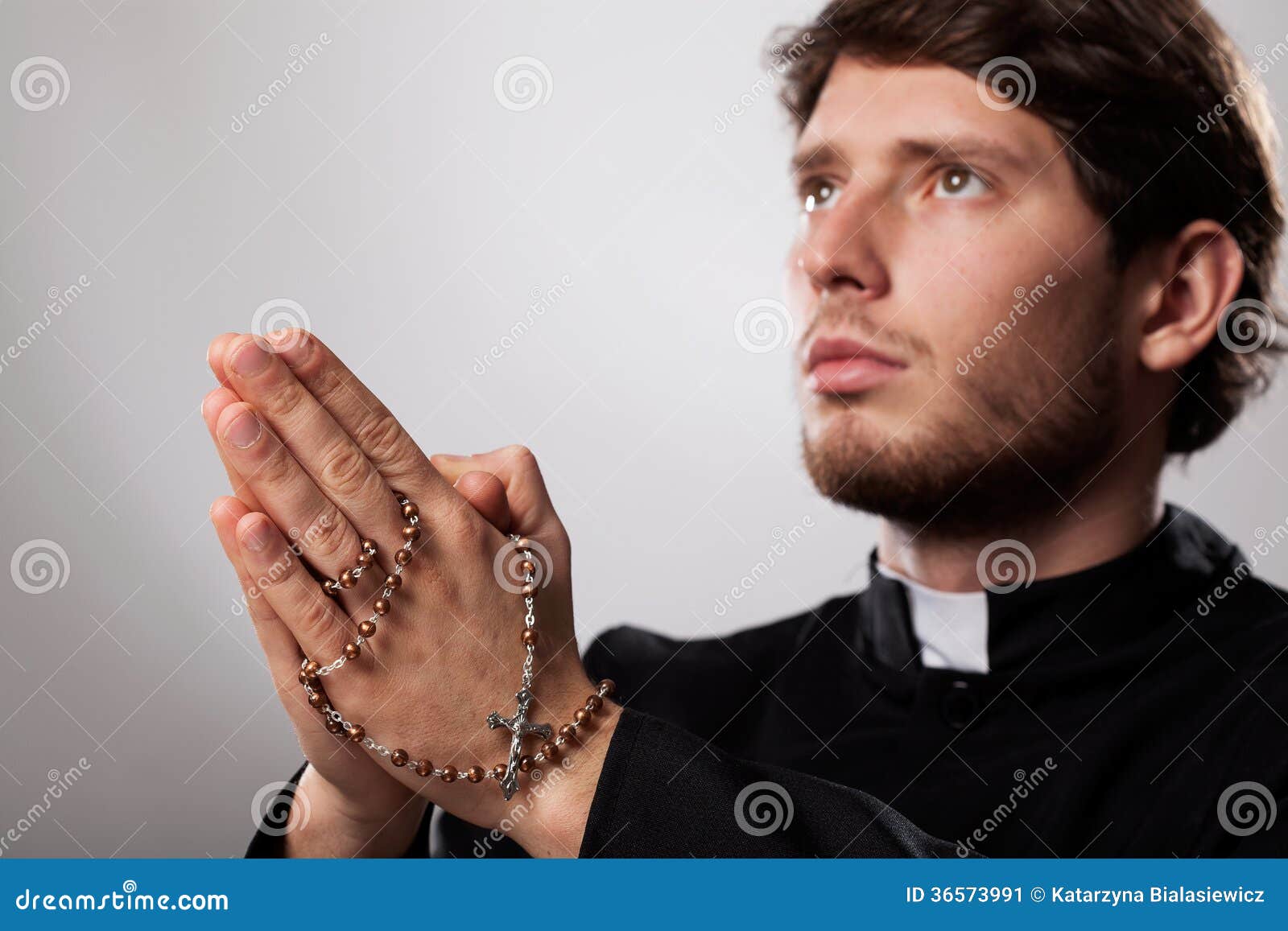 Priest with rosary stock image. Image of priest, religion - 36573991