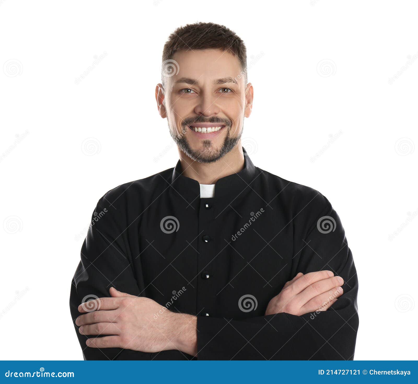 priest wearing cassock with clerical collar on white background