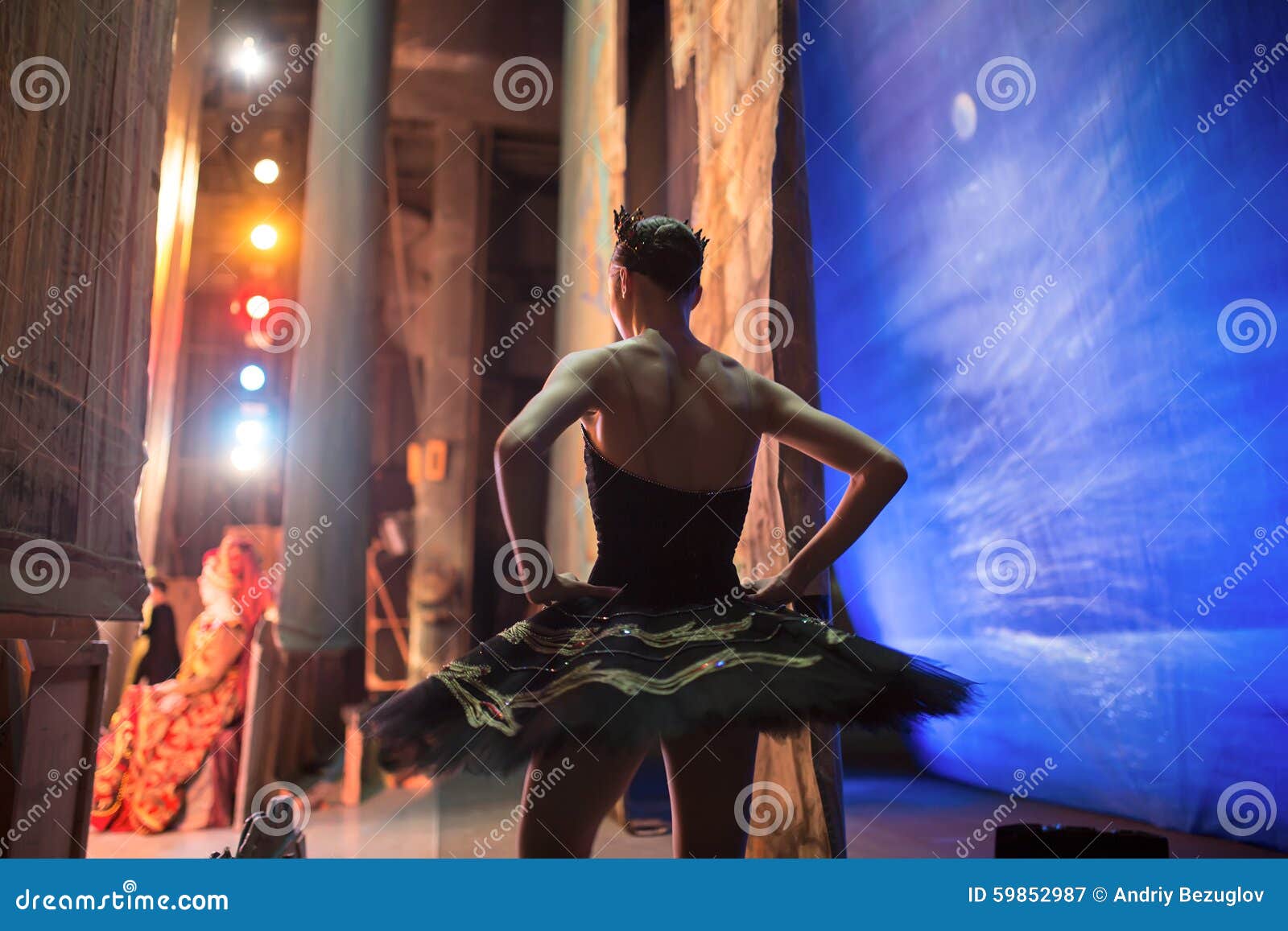 prima ballerina standing backstage