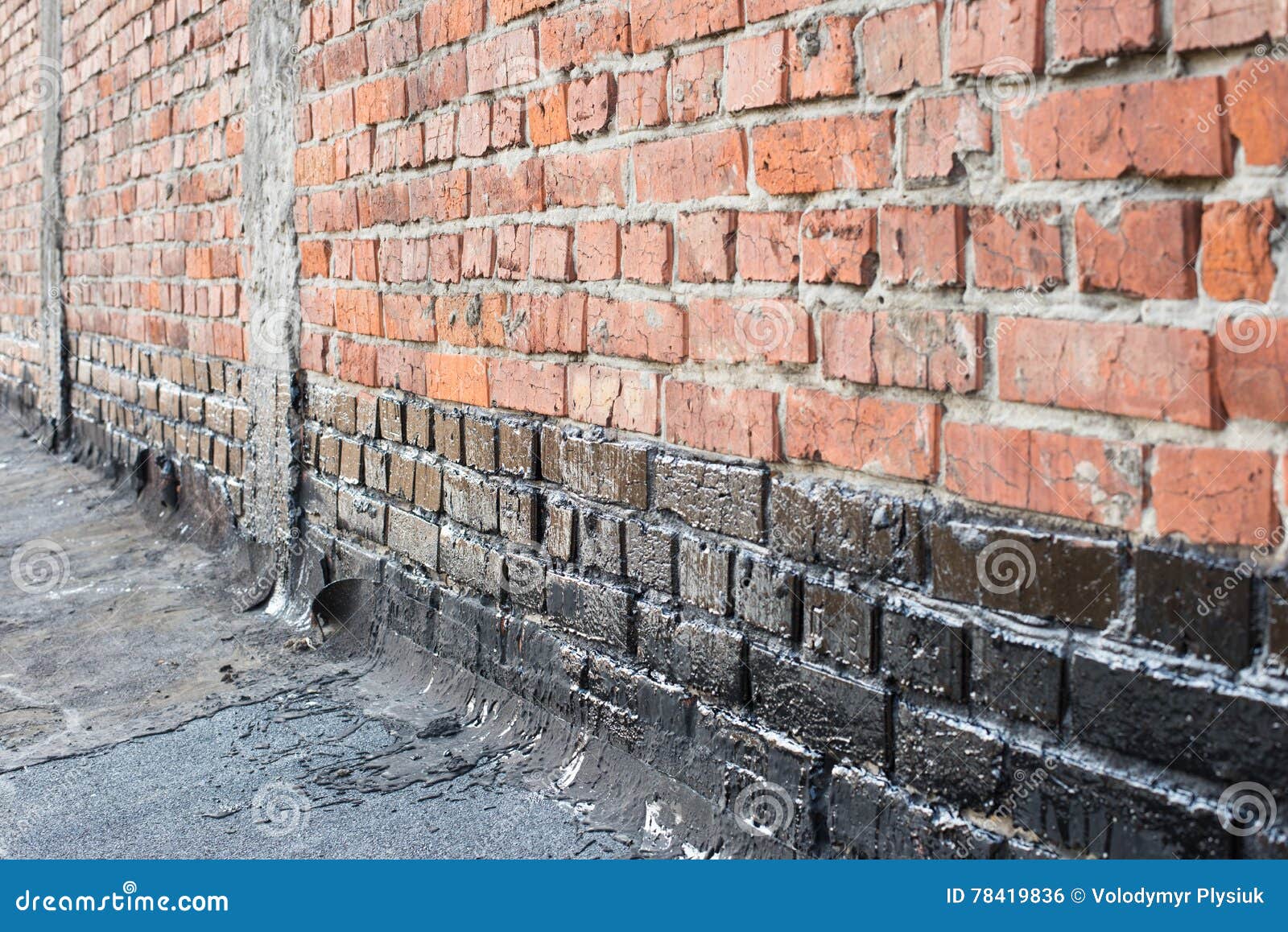 Priming brick wall stock photo. Image of bitumen, contractor 78419836