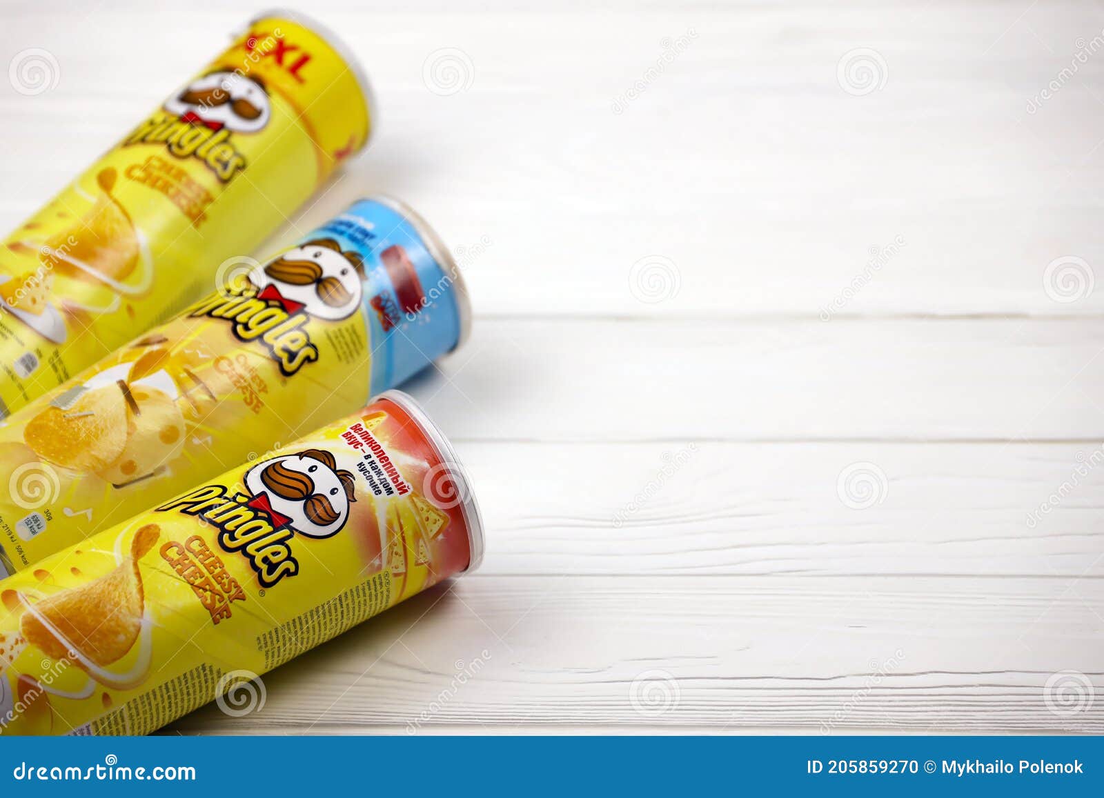 Pringles Cheesy Cheese Flavour. Cardboard Tube Cans with Pringles