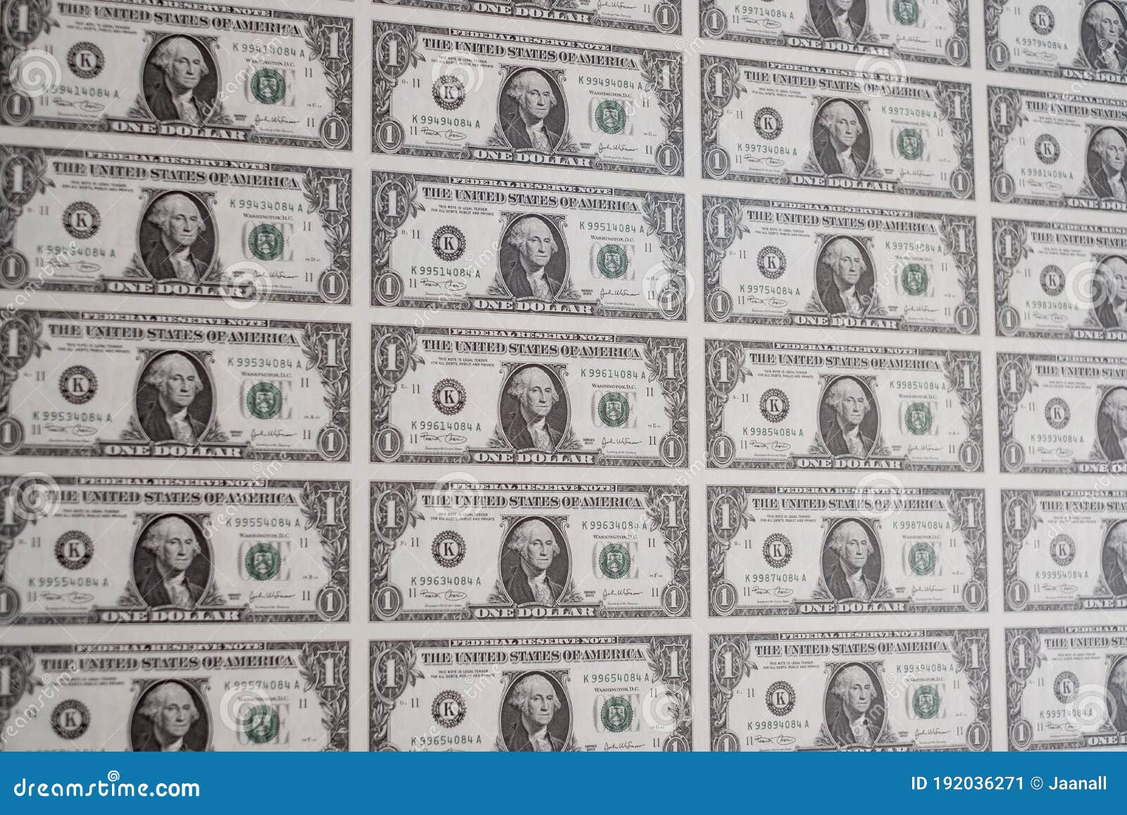 Printing American dollars. Uncut US dollar sheets from printer. Printing money