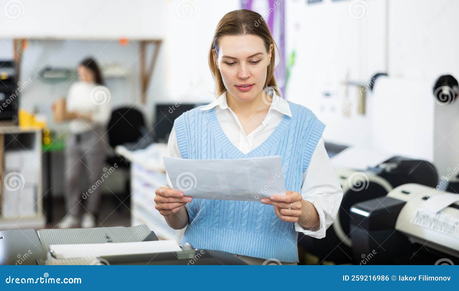 Printing Office Wokrer Looking At Paper Stock Photo Image Of Printout printer-paper-sizes-chart