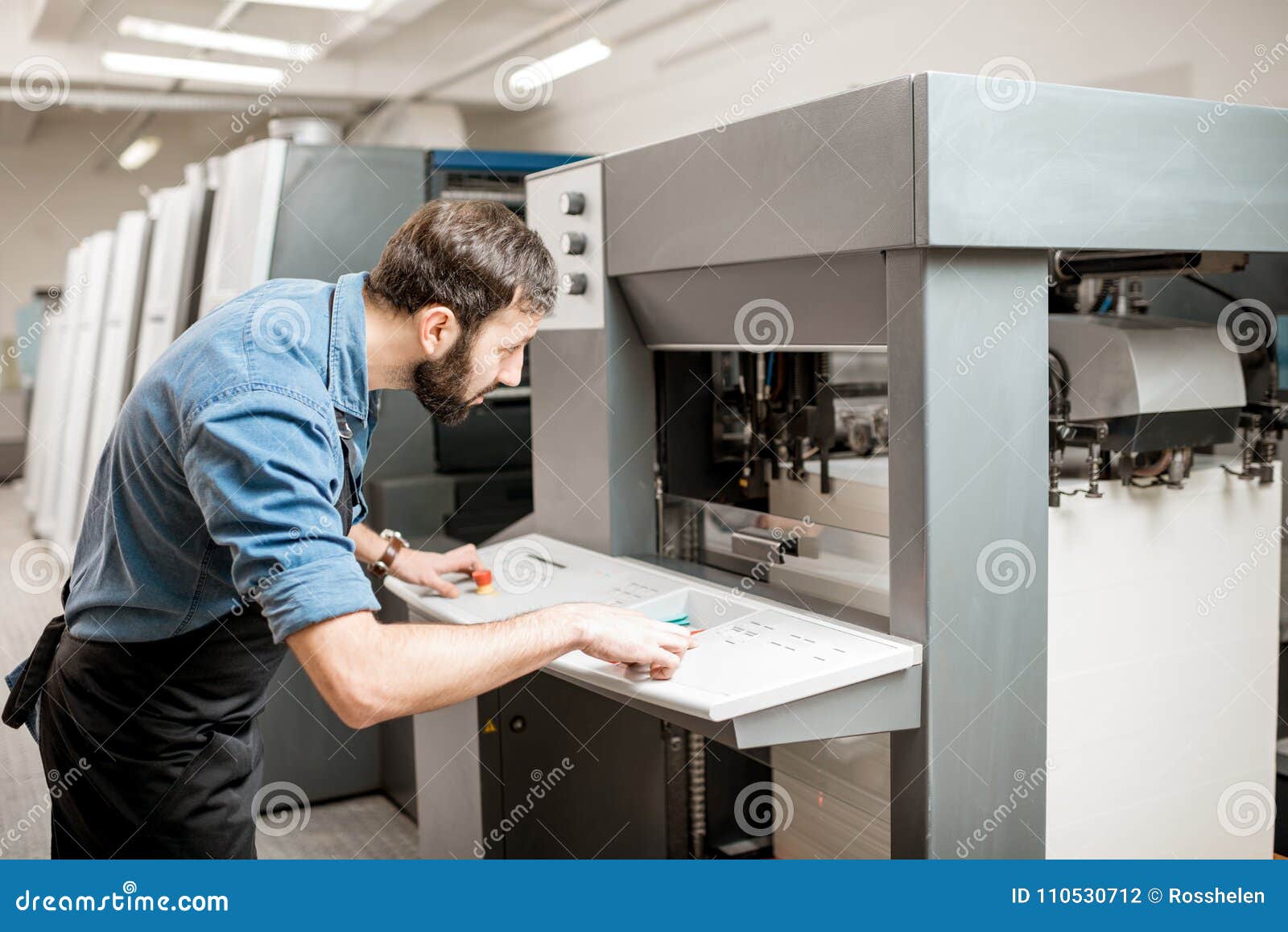Printing Operator Working at the Manufacturing Stock Photo Image of