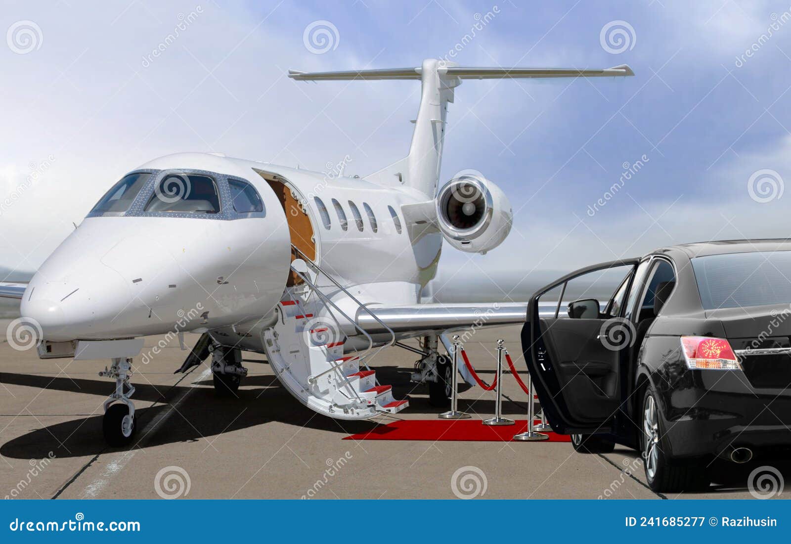 private jet and black car waiting on landing strip in airport