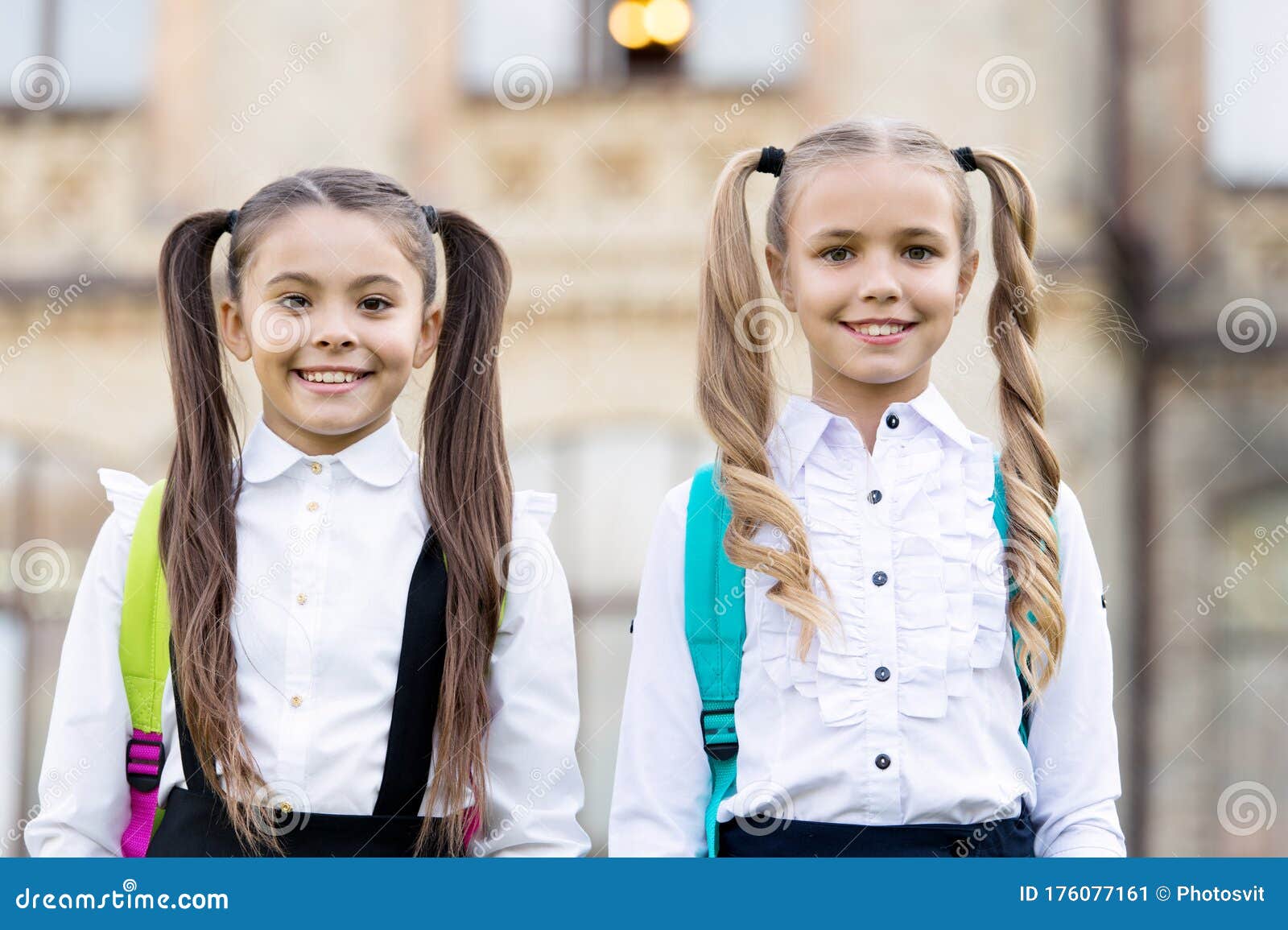 Private School for Girls. School Girls in Pigtails. Happy Girls Back To