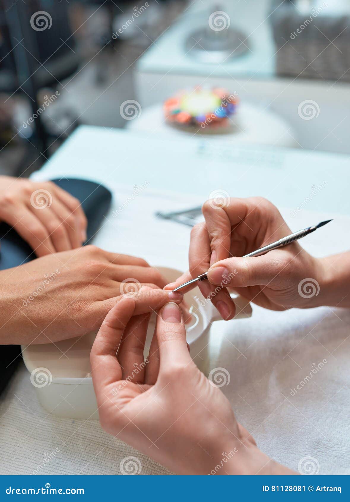 Procedure Cuticle Cutting the Nails, Client`s Hand and Manicure Stock