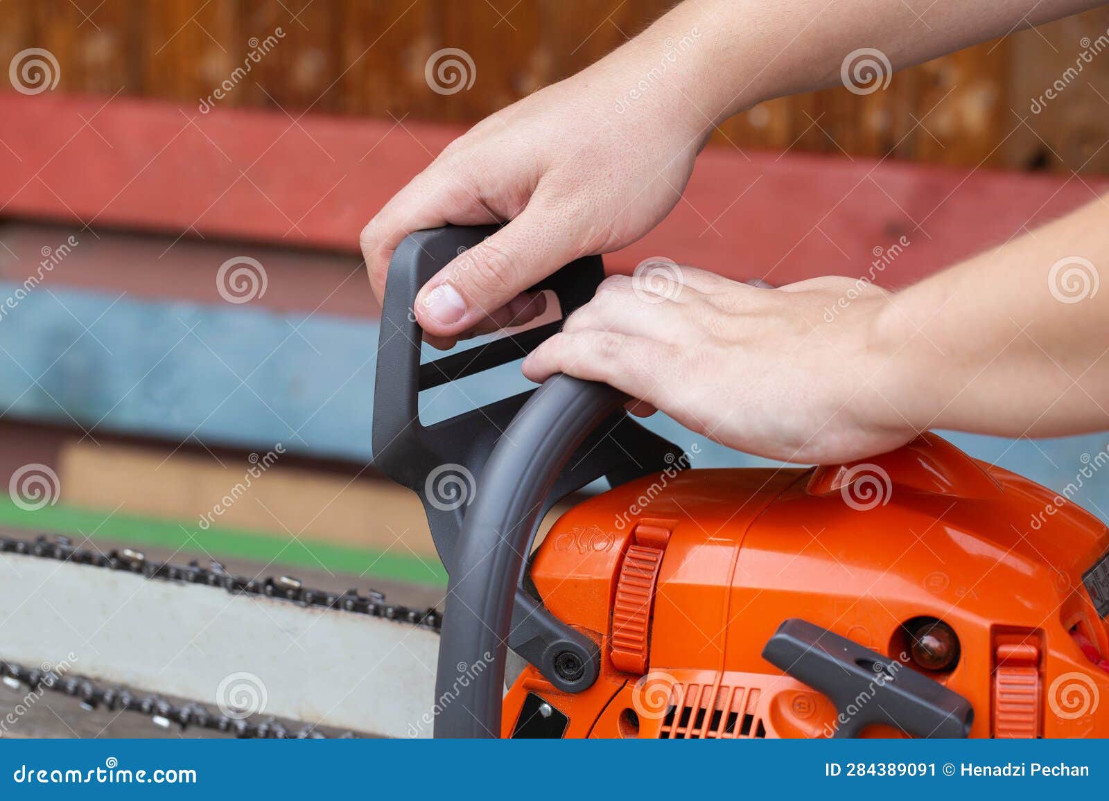 The Process of Activating the Chain Brake in a Chainsaw before Starting