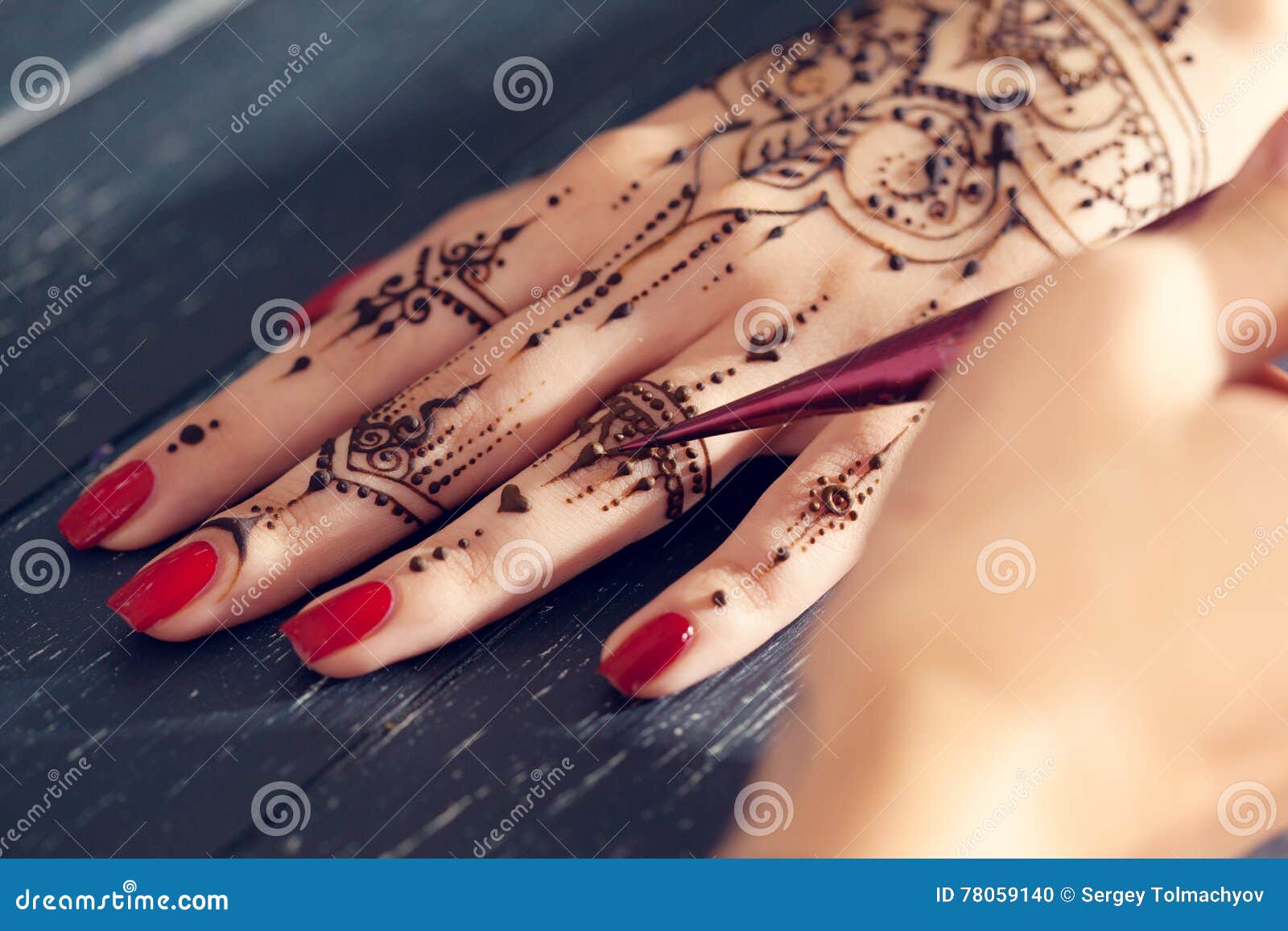 Process of applying mehndi stock photo. Image of hands - 78059140