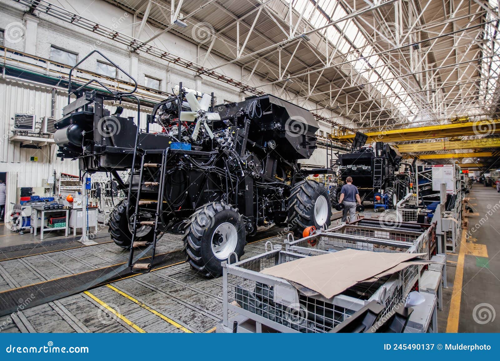 The Process of Assembling Agricultural Tractors and Harvesters on the