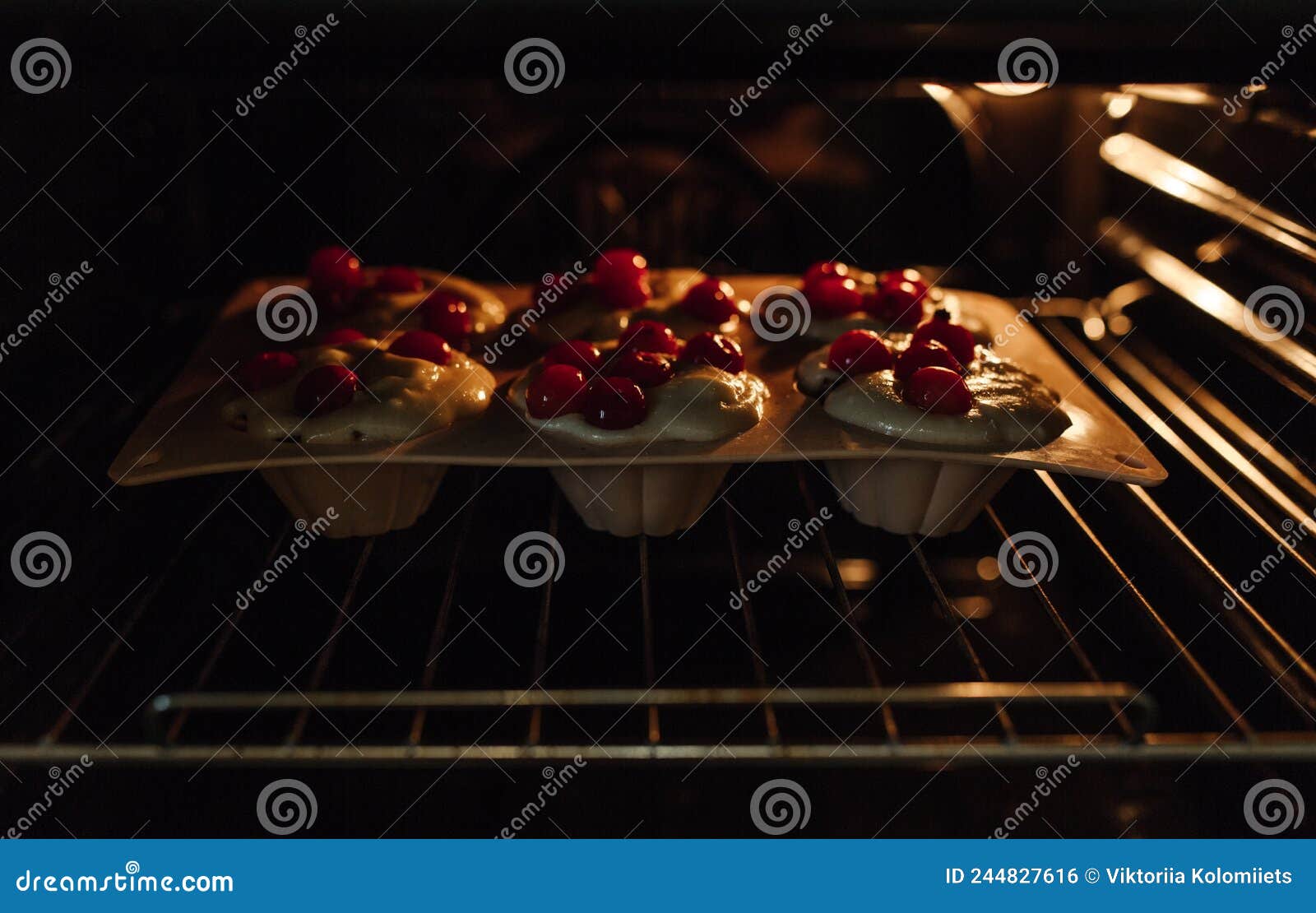 The Process of Baking Cupcakes in the Oven. Dough for Baking Cupcakes