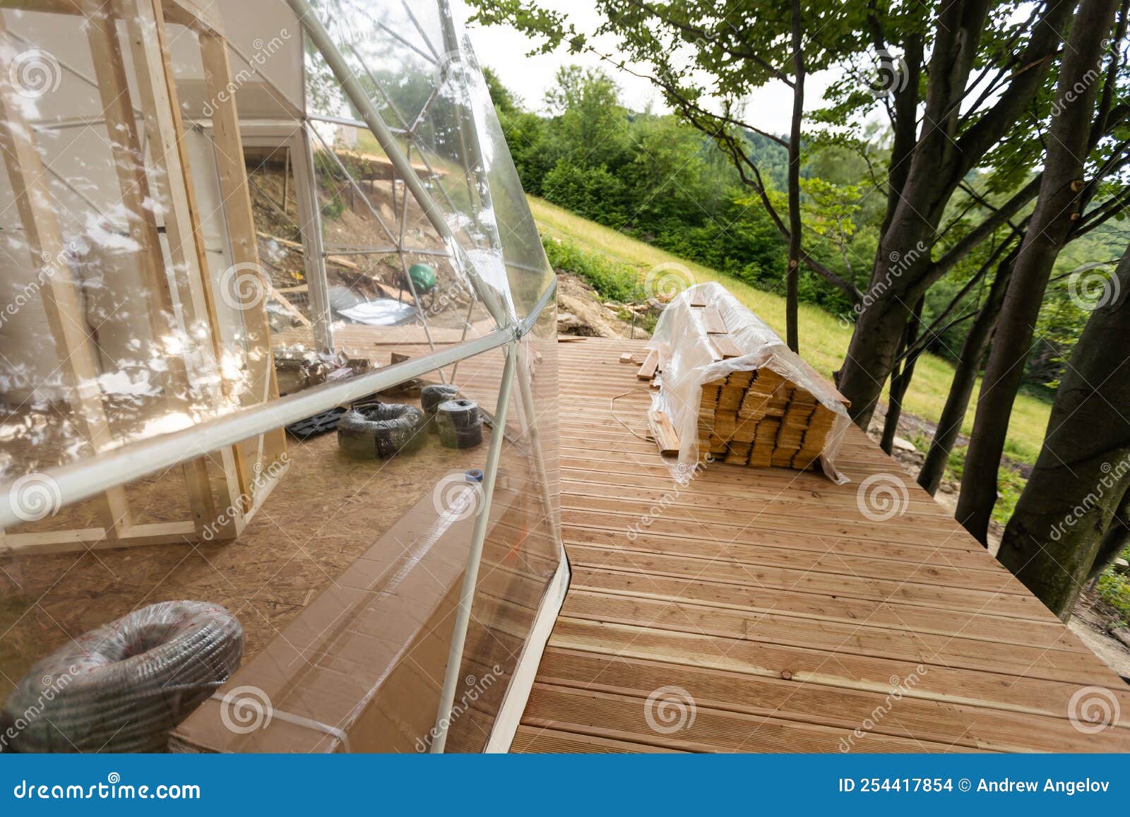 The Process of Building a Dome Tent in the Mountains Stock Photo